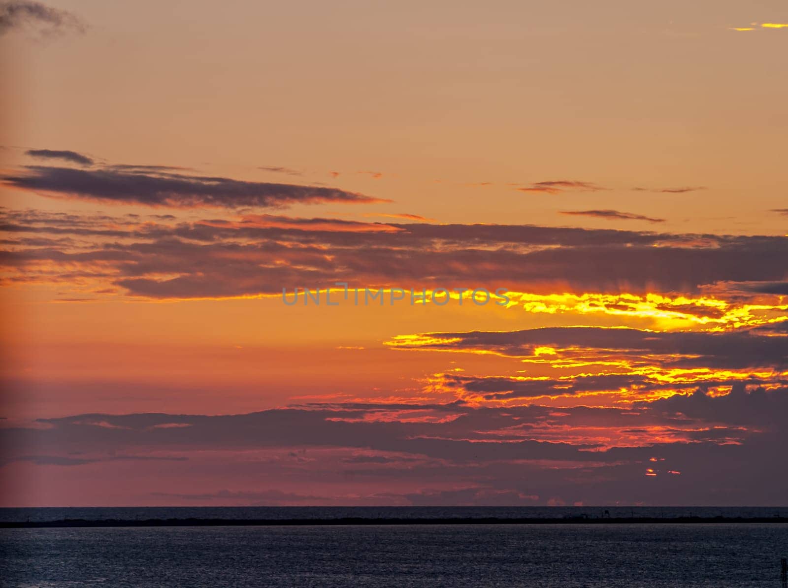 Fantastic sunset on the beach of Cortadura on Cadiz, Spain