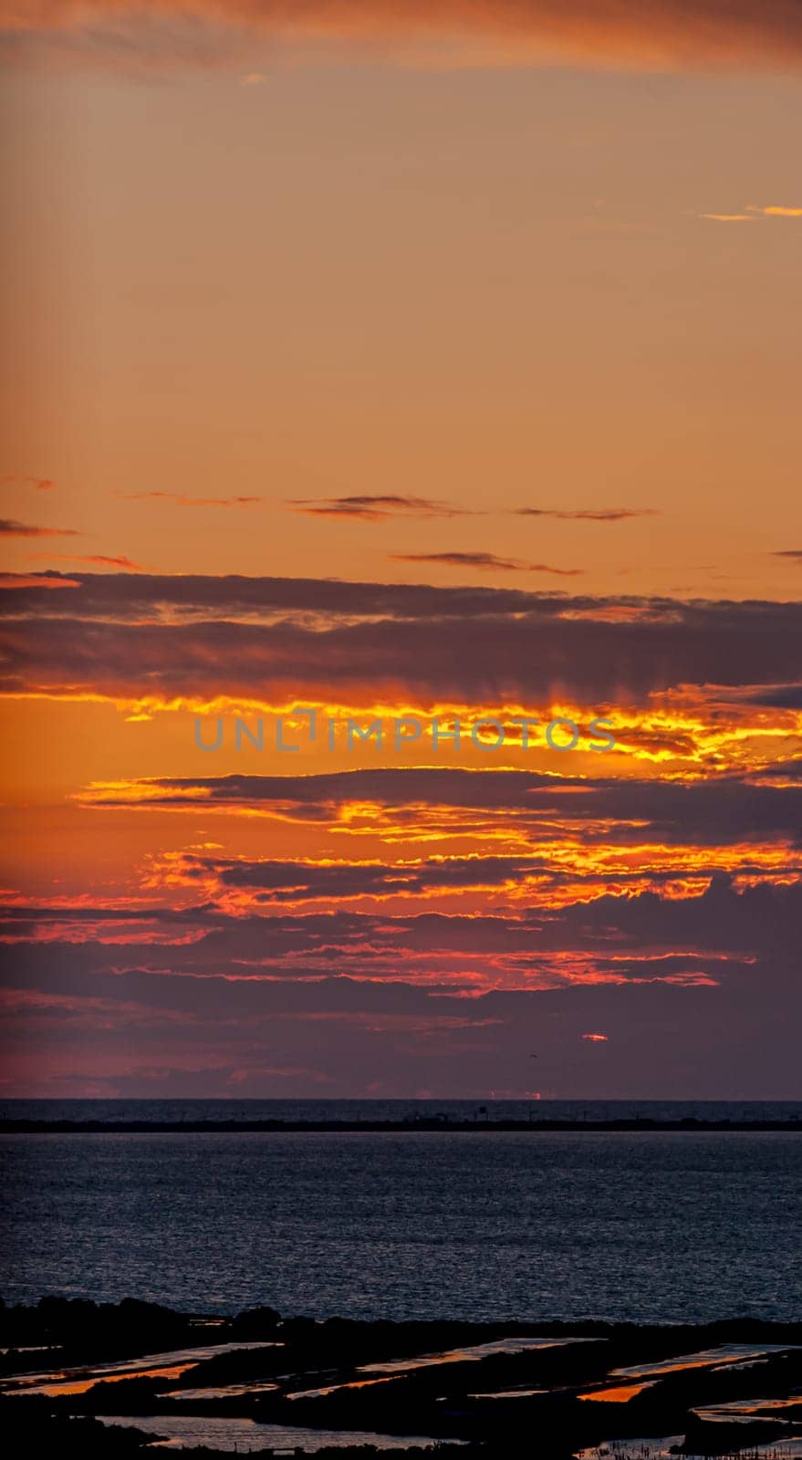 Fantastic sunset on the beach of Cortadura on Cadiz, Spain