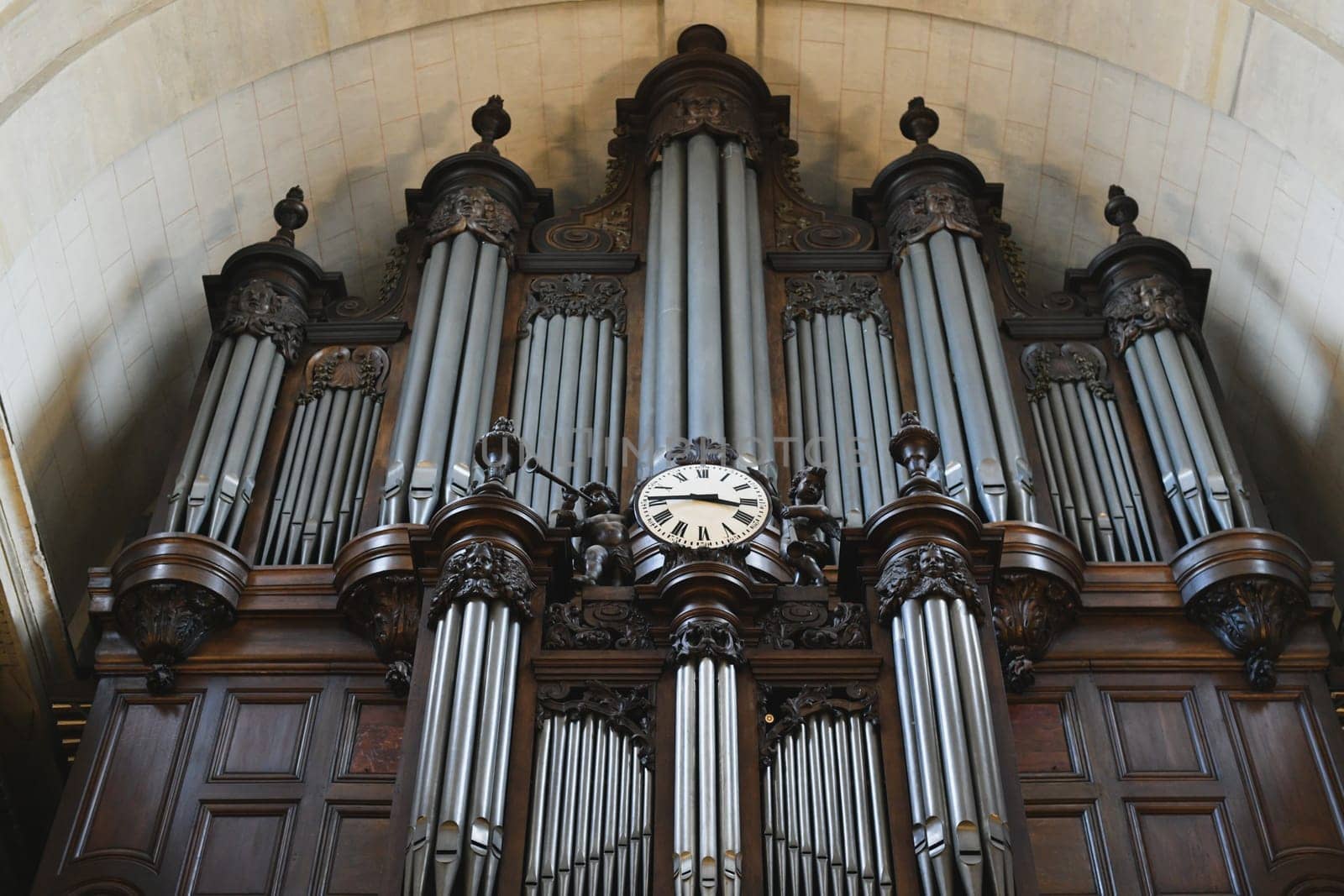 The organ in the church and the carved old wood around by Godi