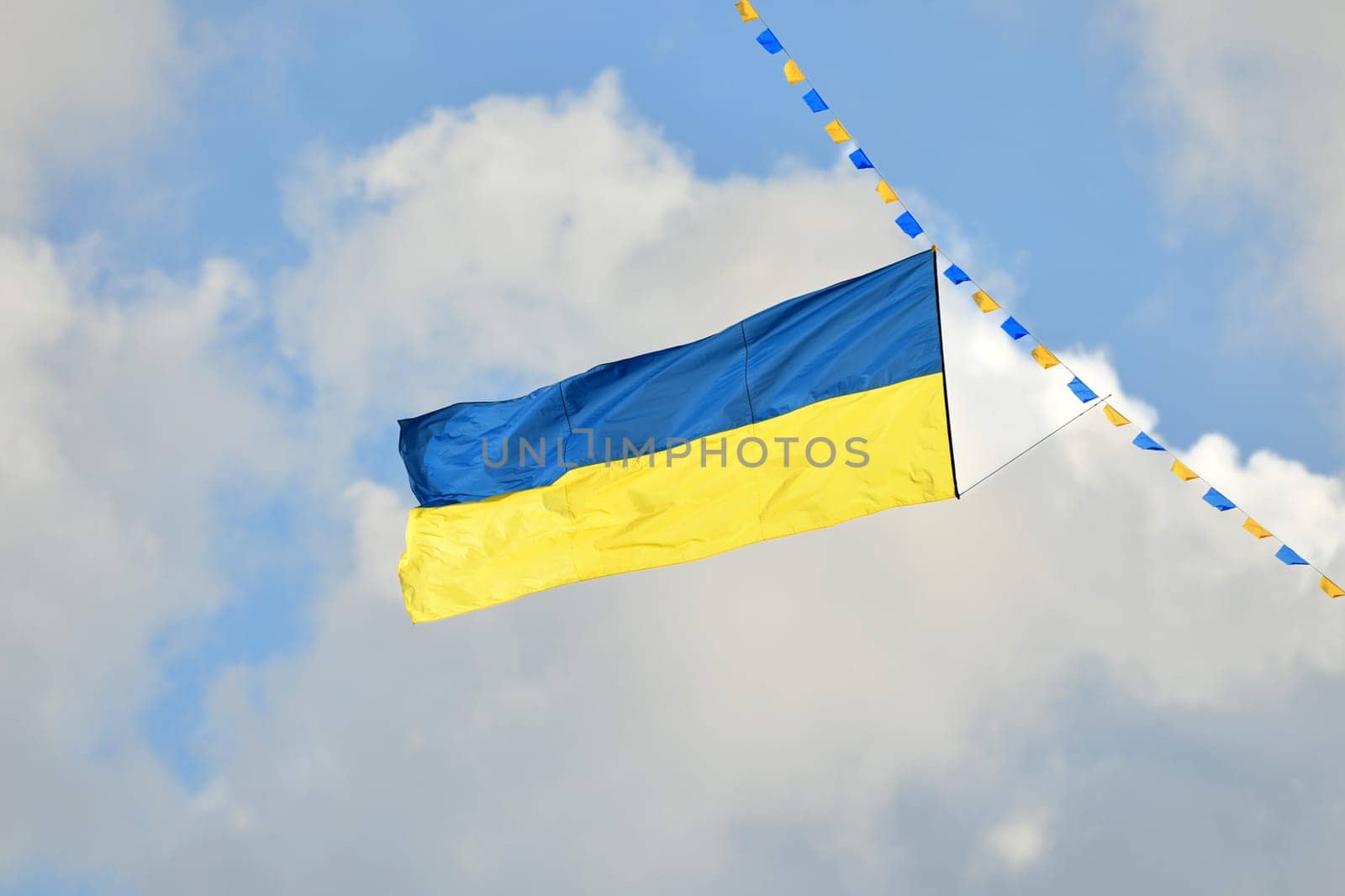 Yellow-blue Ukrainian flag in the sky
