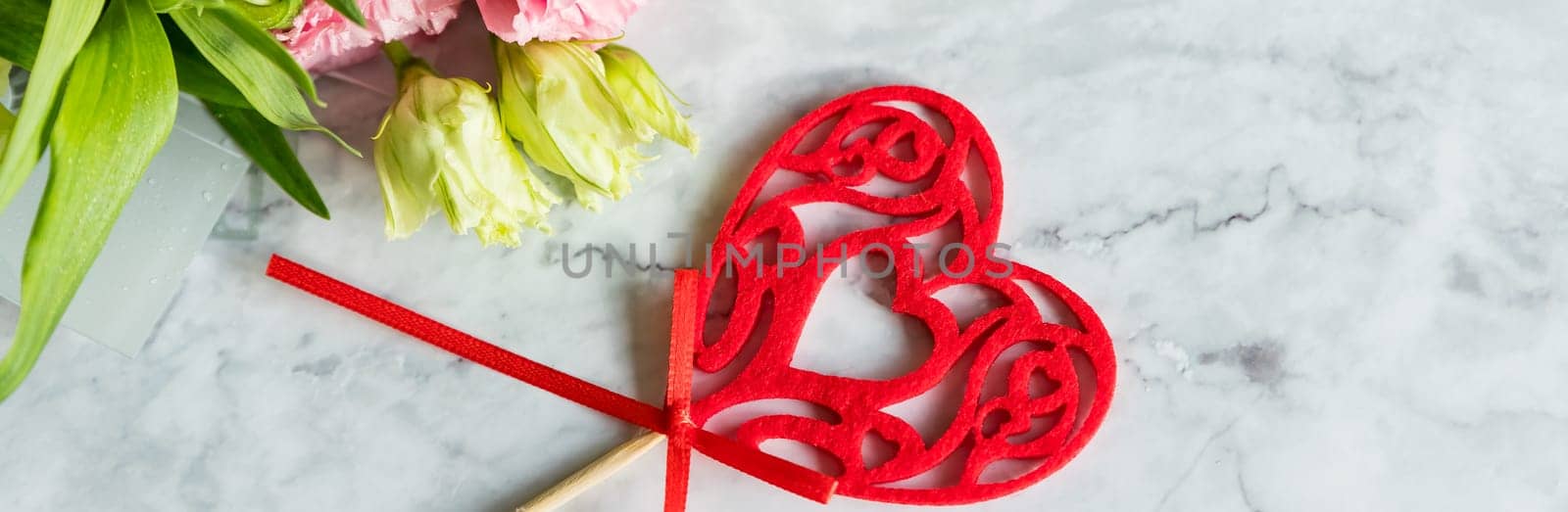 Valentines day background . Romantic layout. Red hearts on white marble background. Top view. Place for text.