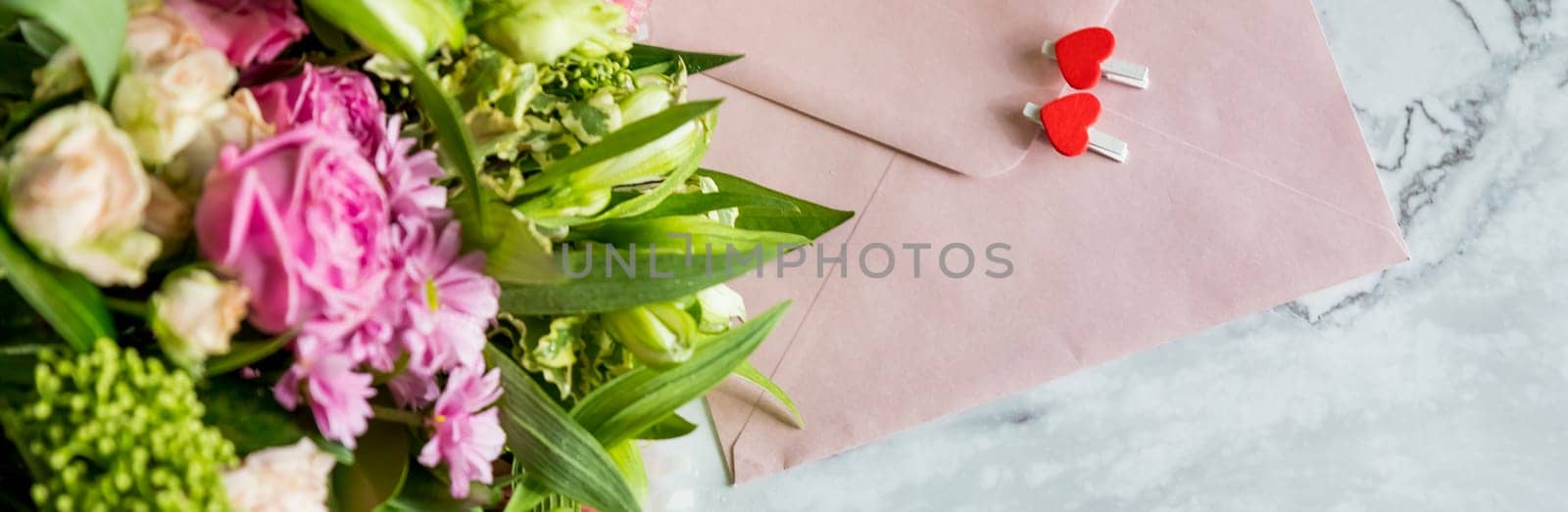 Festive flat lay arrangement of pale pink roses,white eustoma, envelope, hearts.Holiday card Festive mock up for Valentine's day, mother's day, wedding, birthday.Valentine's Day celebration by YuliaYaspe1979