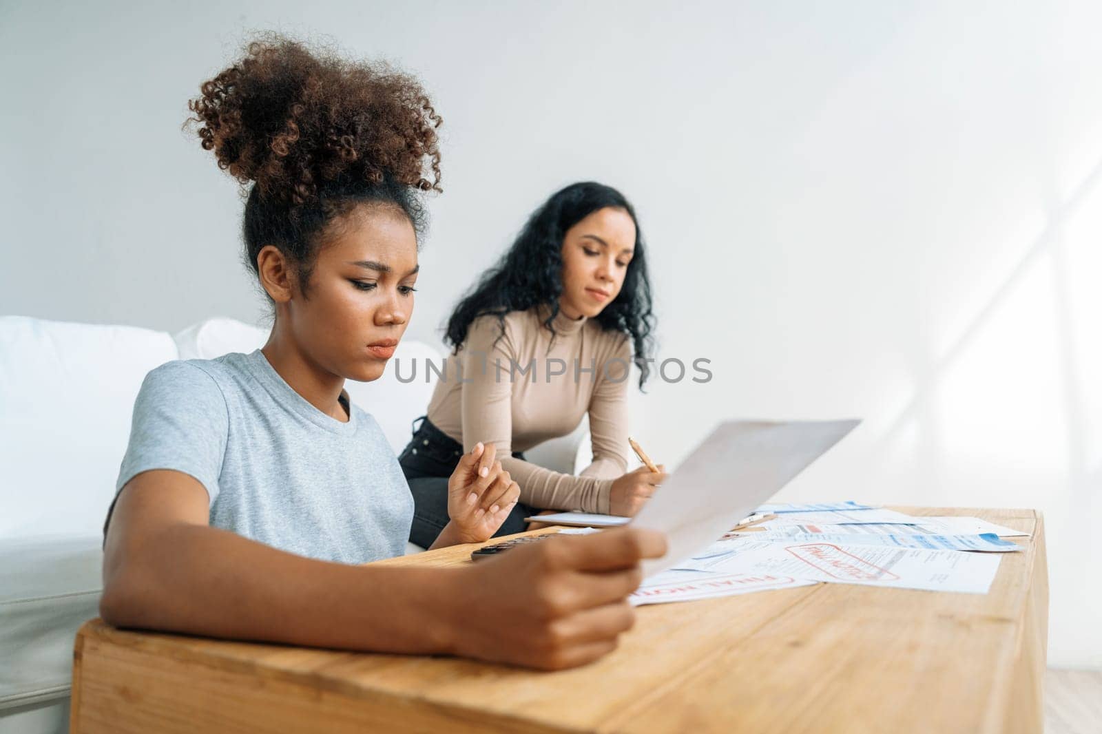 Stressed African American women has financial problems with credit card debt to pay crucial show concept of bad personal money and mortgage pay management crisis.