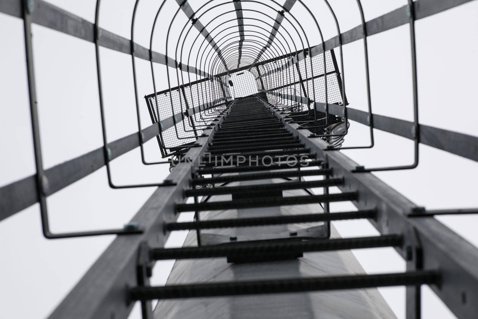 Stairs on a pole for climbing to the field for maintenance. Selective focus. High quality photo