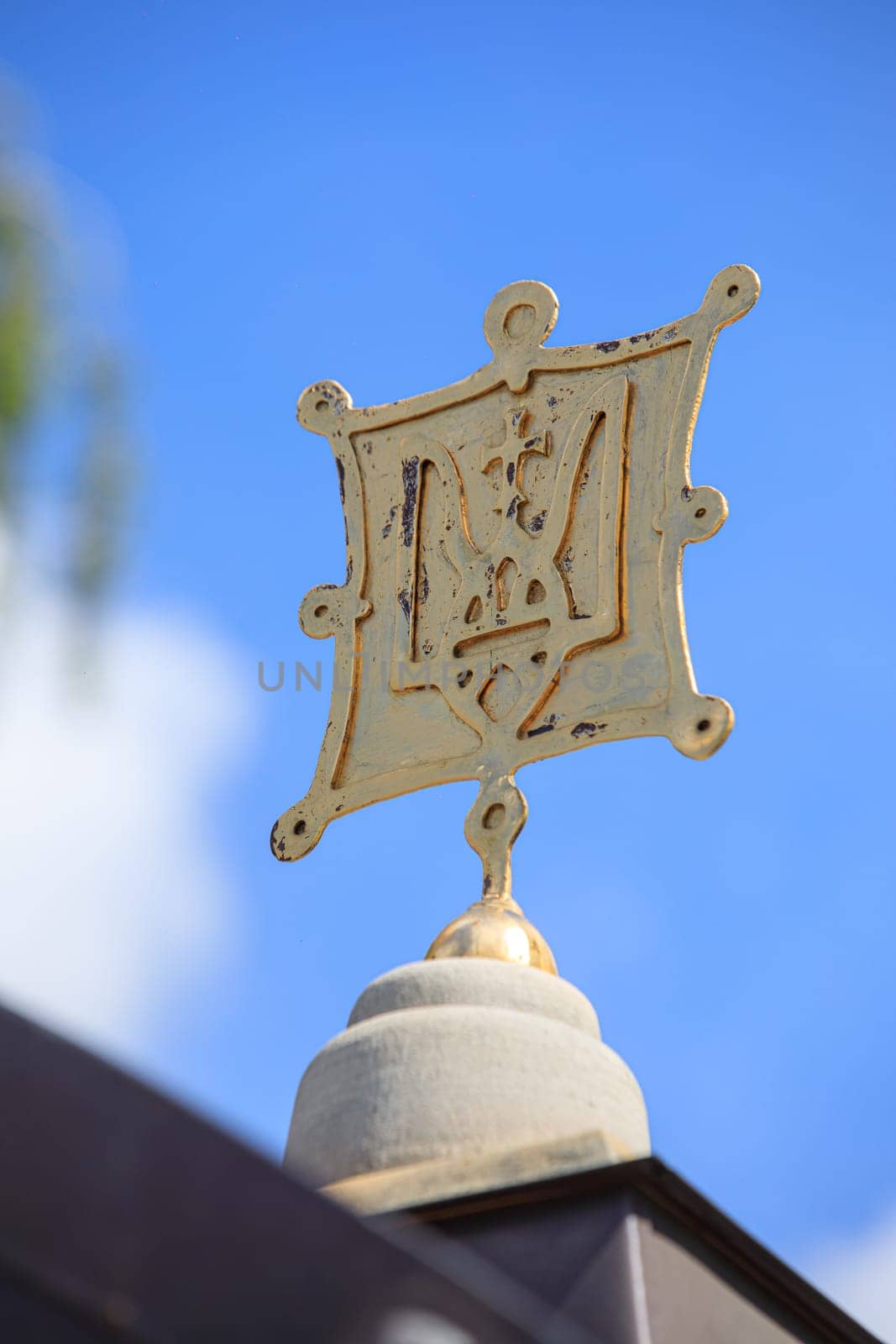 ancient coat of arms of Ukraine with a cross. High quality photo