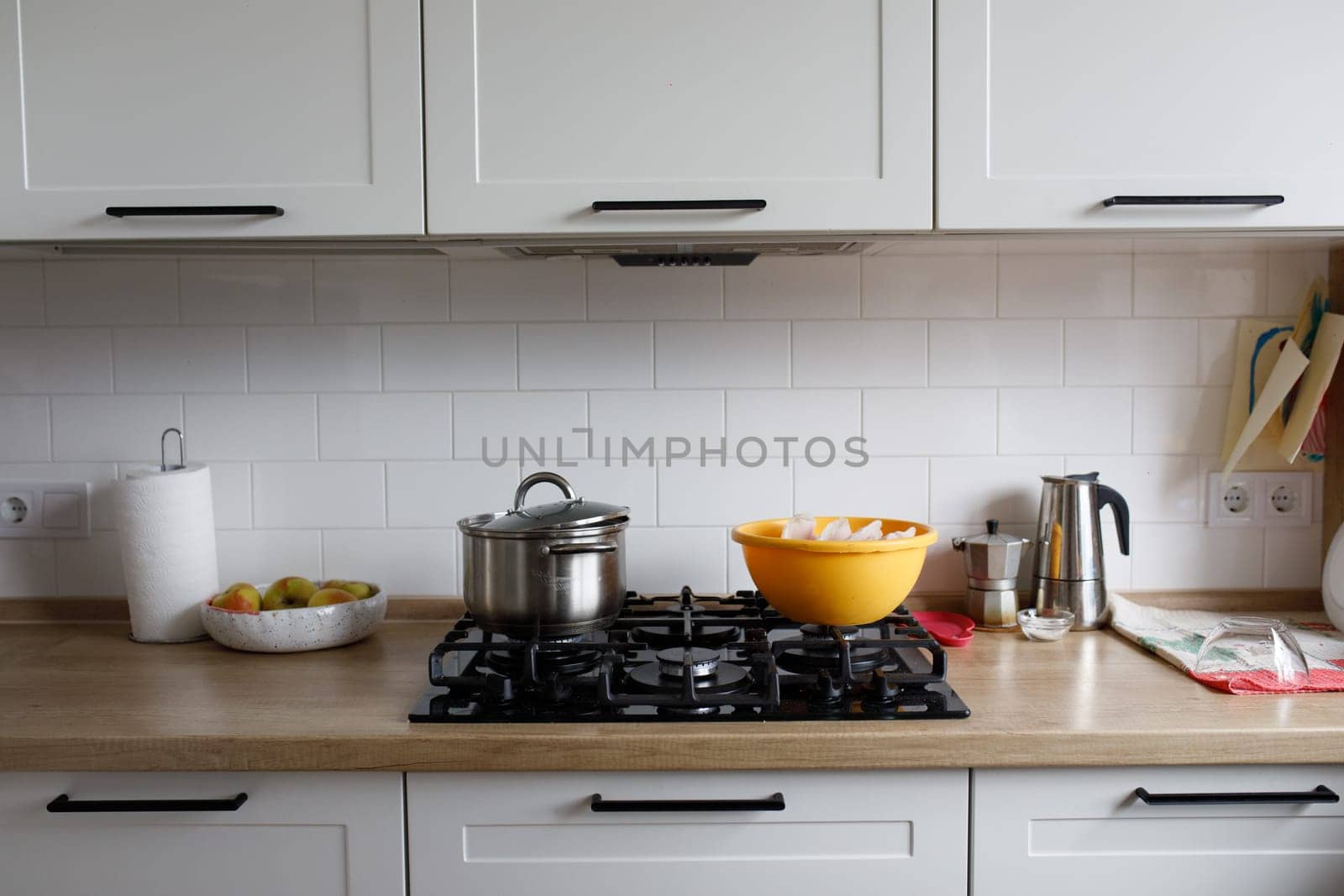 stove and saucepan, yellow bowl. High quality photo
