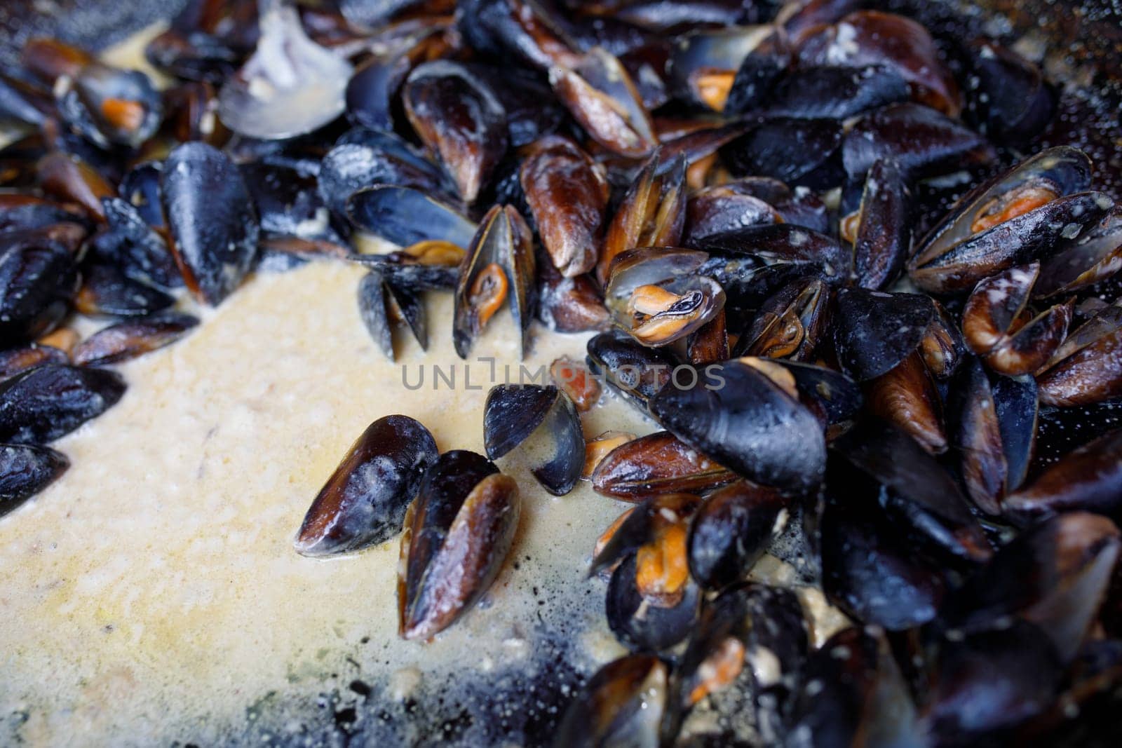 mussels are cooked on the street. High quality photo