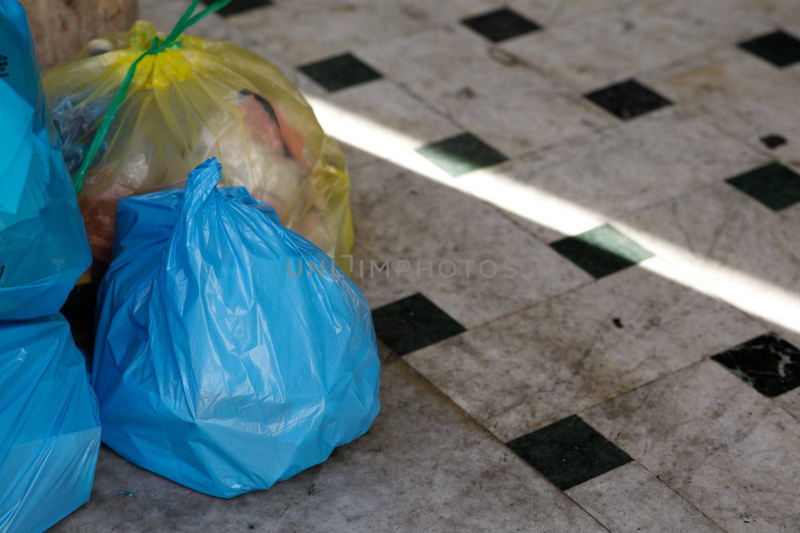 garbage bags on the floor. High quality photo