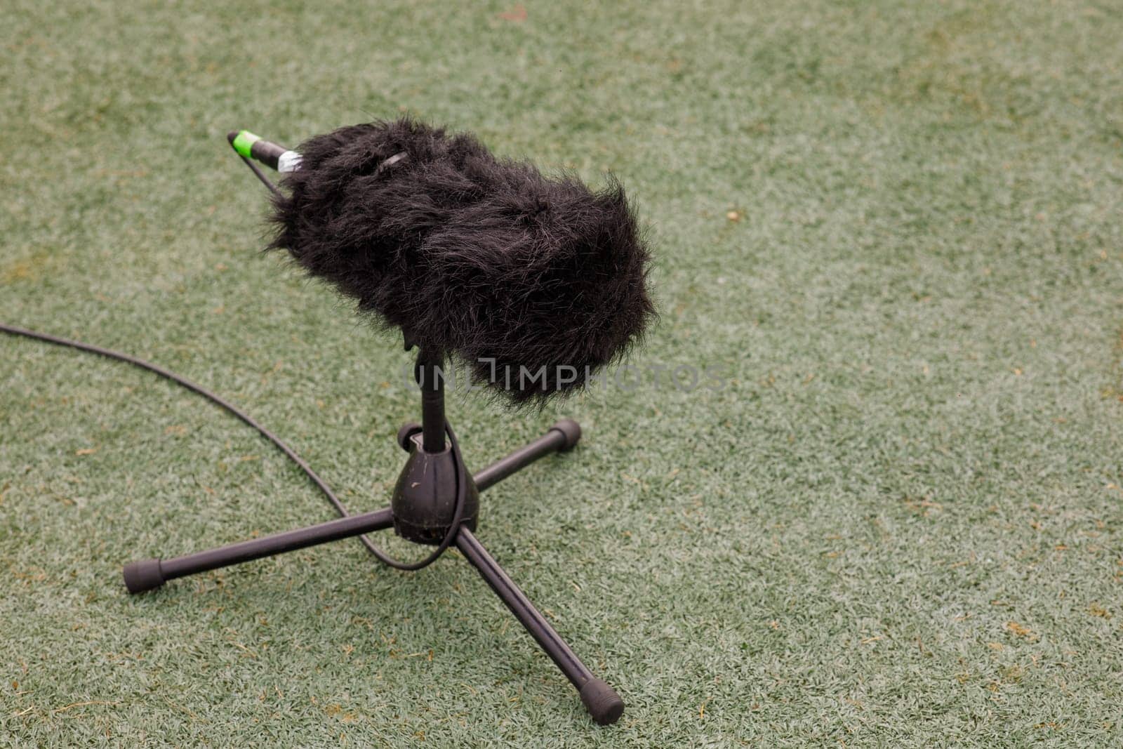 microphone on the ground football field. High quality photo