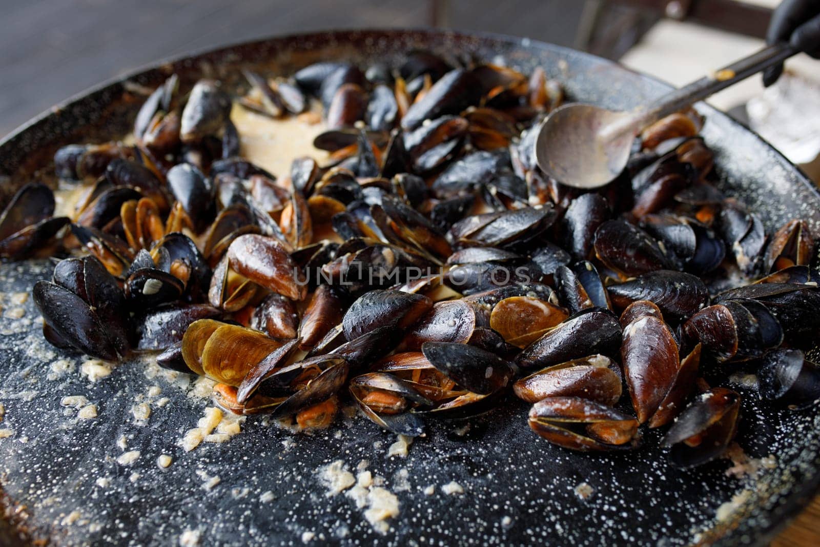 mussels are cooked on the street. High quality photo