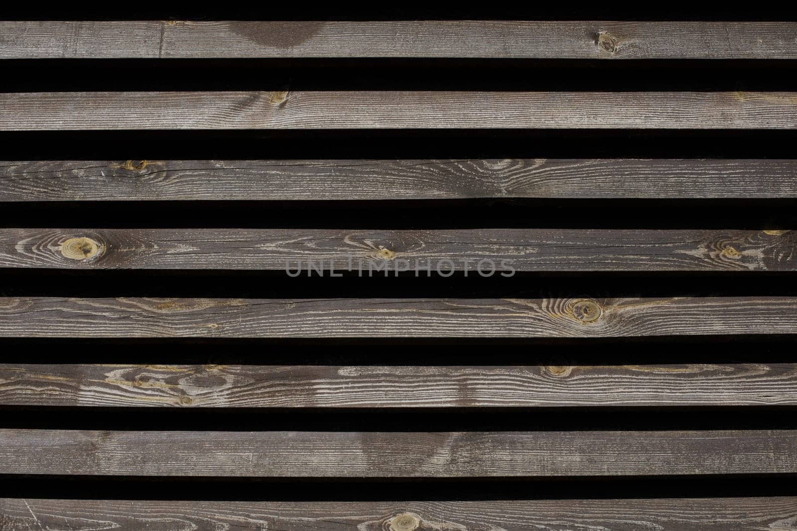 boards horizontally, wooden fence made of boards. High quality photo