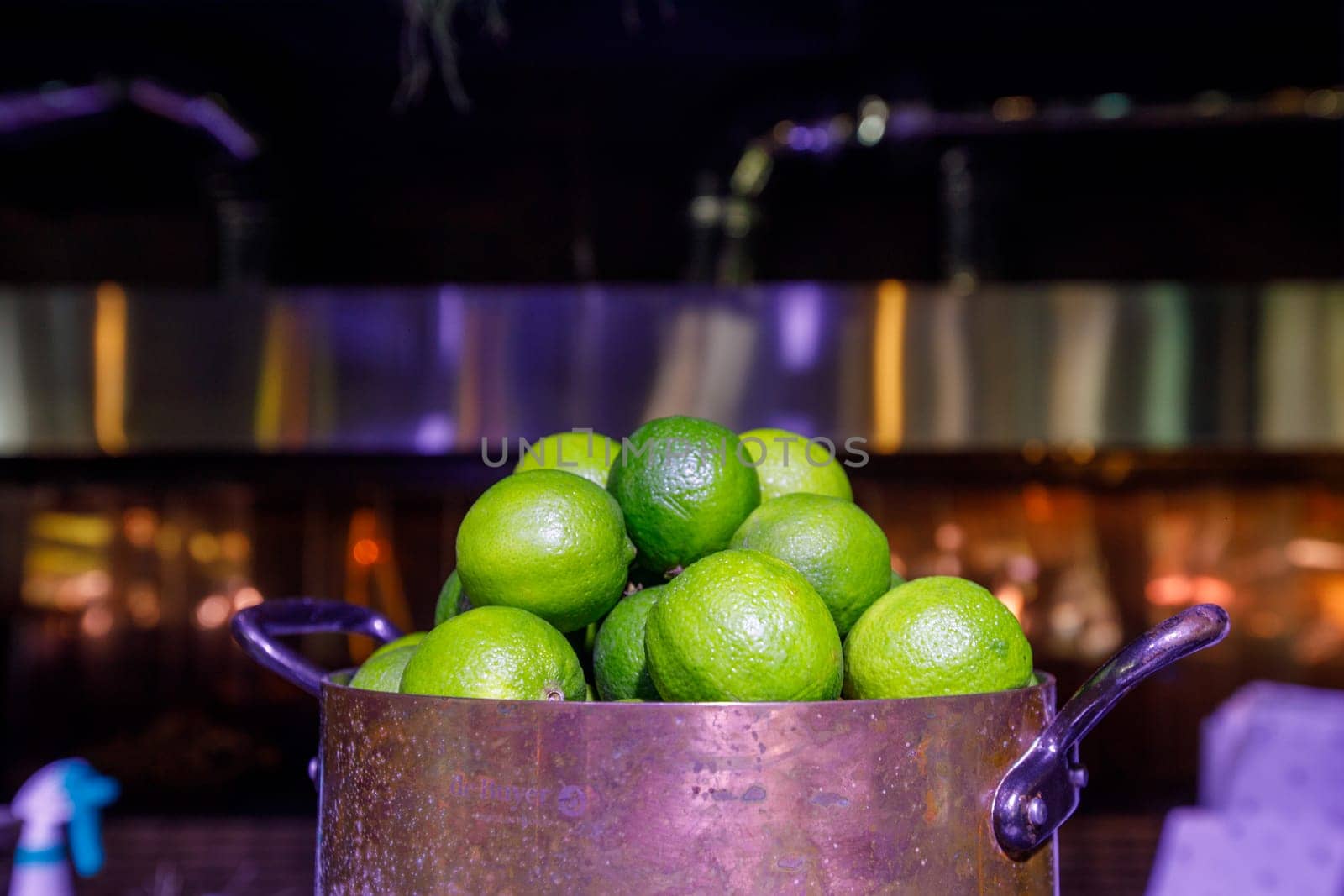 lime in a saucepan, muted dark background. High quality photo
