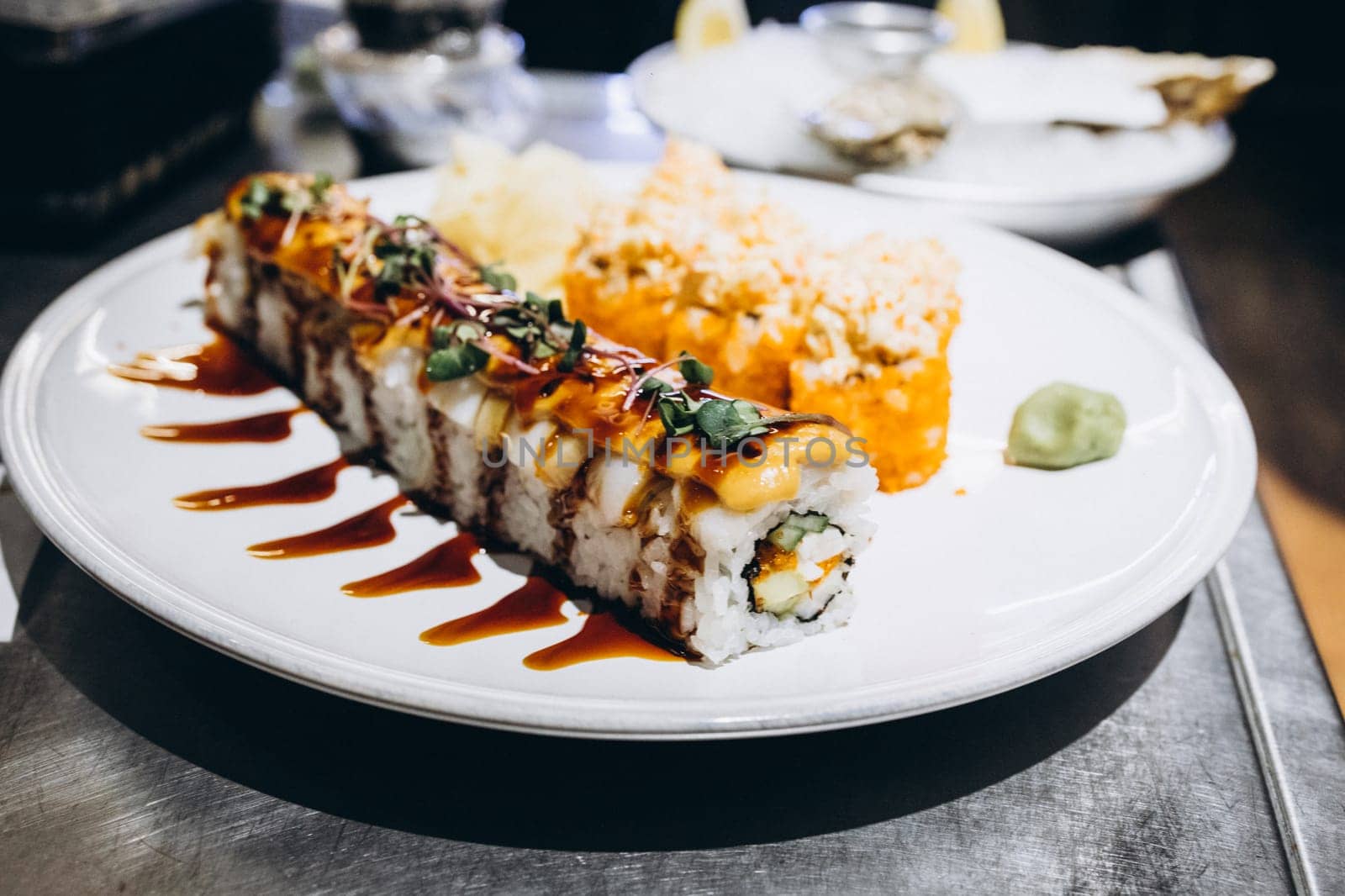sushi on a plate, a dish in a restaurant. High quality photo