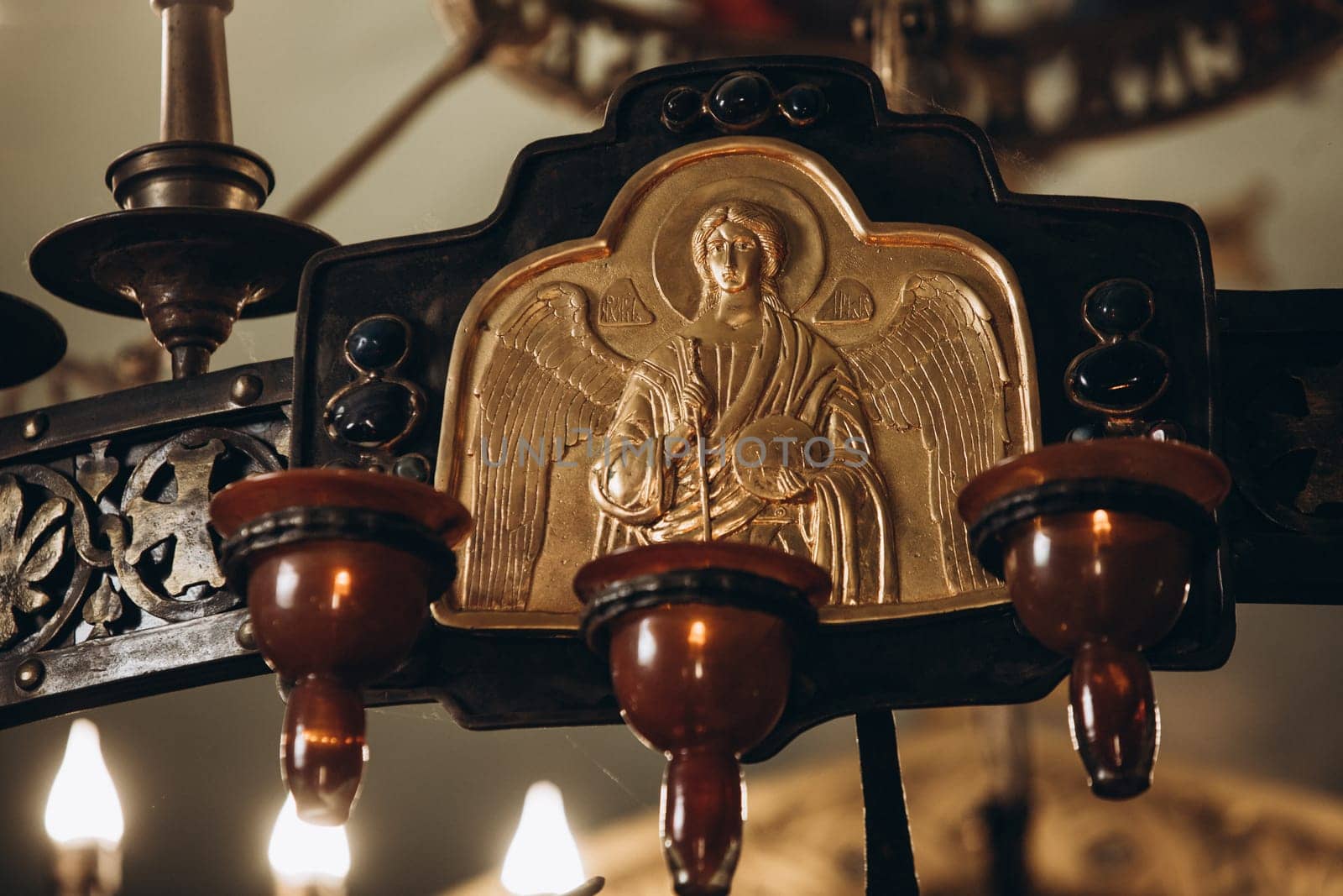 the icon lamp in the church hangs near the icon. High quality photo