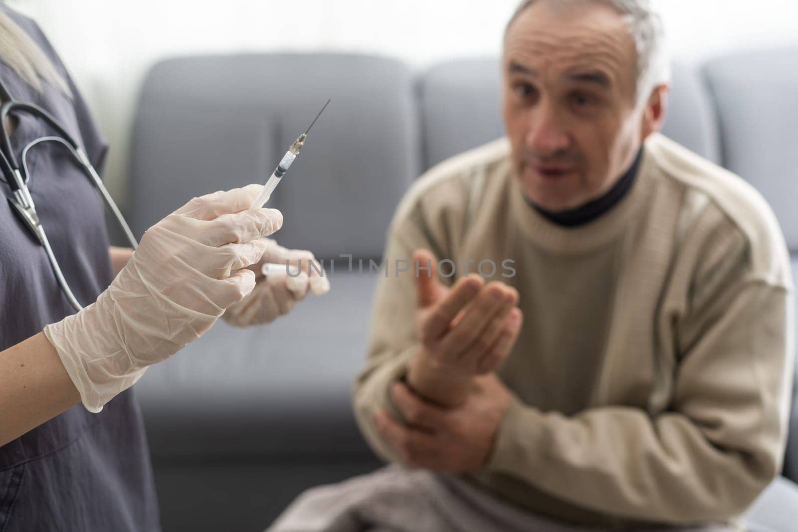 elderly man getting coronavirus vaccine.