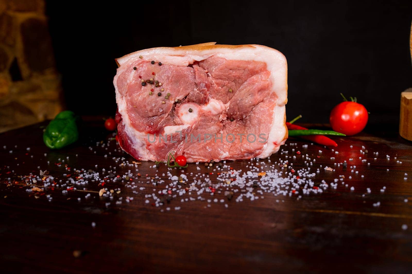 Raw rib eye beef steak on a black background. High quality photo