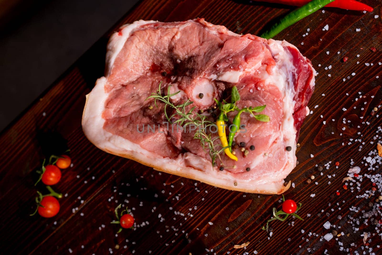 Raw rib eye beef steak on a black background. High quality photo