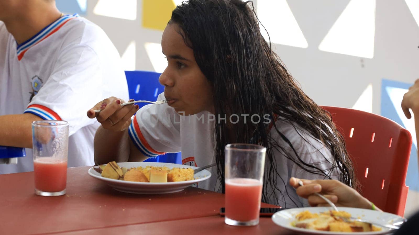 euclides da cunha, bahia, brazil - setembro 18, 2023: students from a public school having a meal at the teaching unit