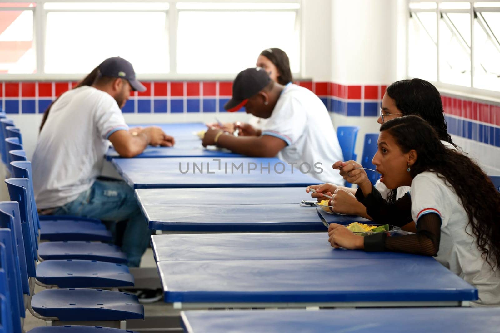 euclides da cunha, bahia, brazil - setembro 18, 2023: students from a public school having a meal at the teaching unit.