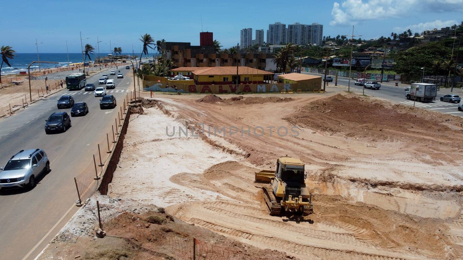 salvador, bahia, brazil - november 20, 2024: workers working on the Atlantic coast of the city of Salvador.