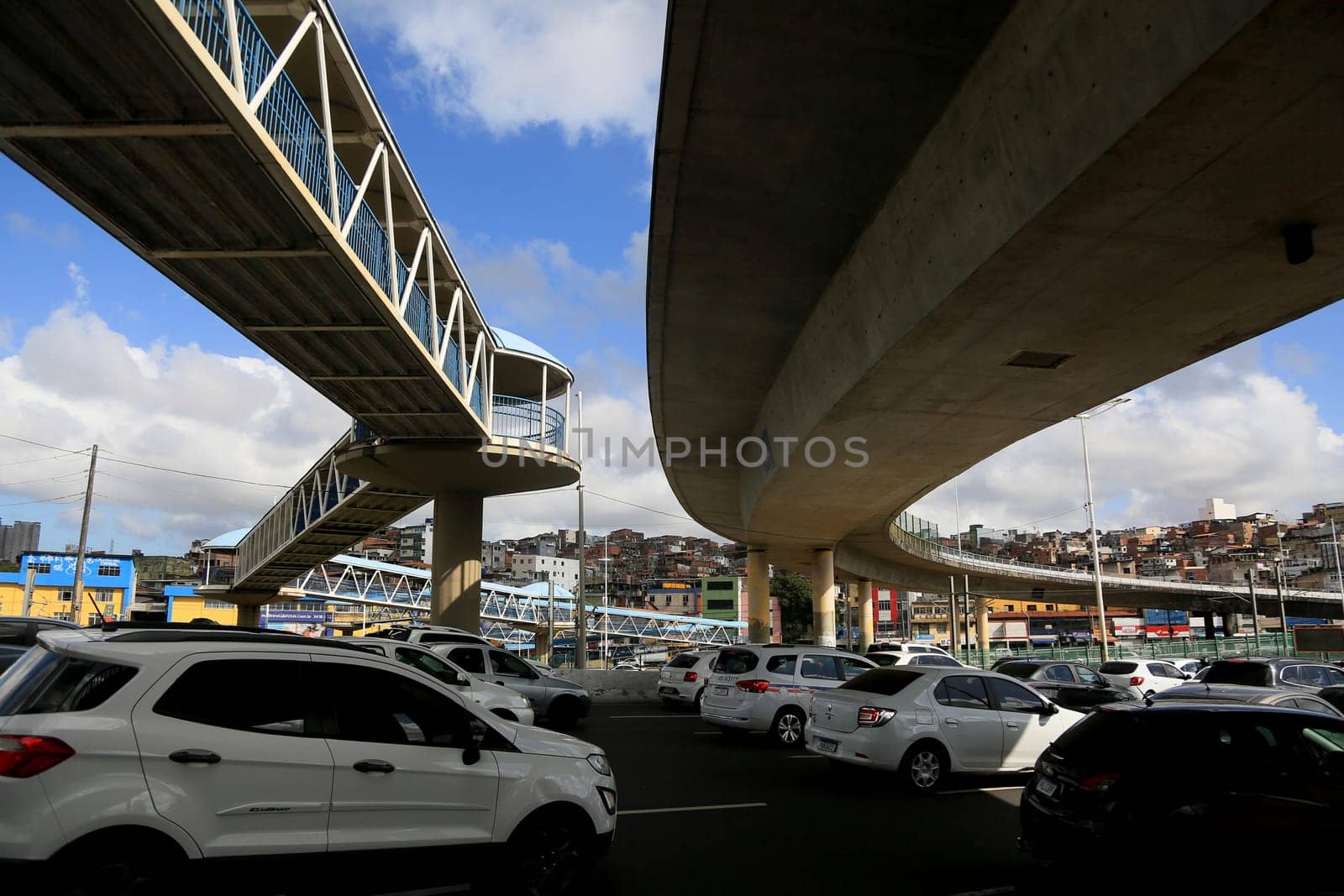 salvador, bahia, brazil - november 11, 2023: vehicle movement in traffic next to a viaduct in the city of Salvador.