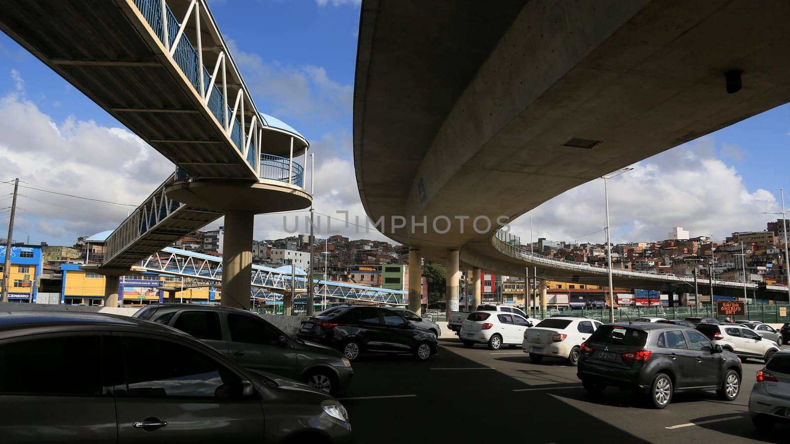 salvador, bahia, brazil - november 11, 2023: vehicle movement in traffic next to a viaduct in the city of Salvador.