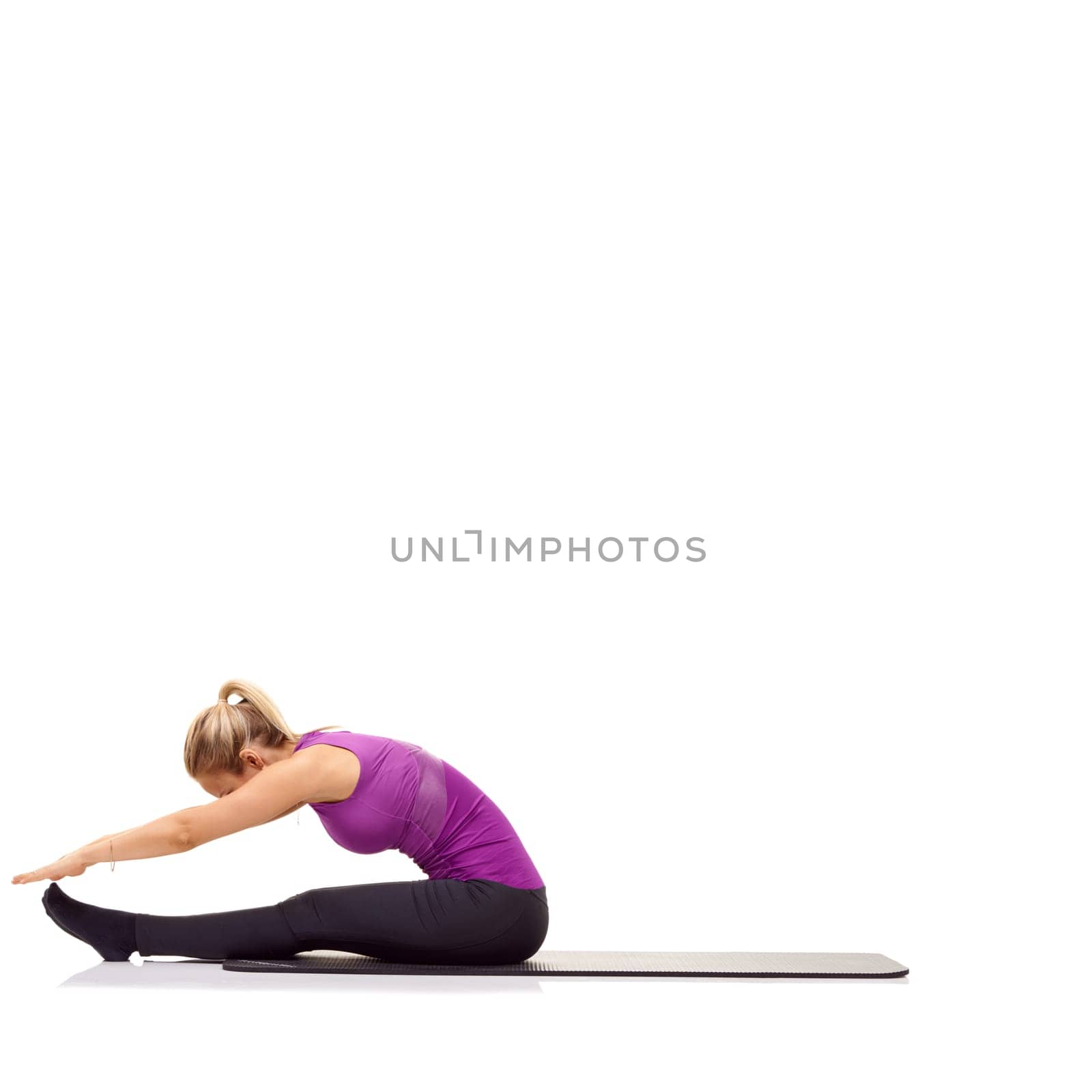 Woman, stretching or fitness on mat in studio for exercise, workout or healthy body with mock up space. Person, training or wellness for abdomen muscle or core strength and yoga with white background by YuriArcurs