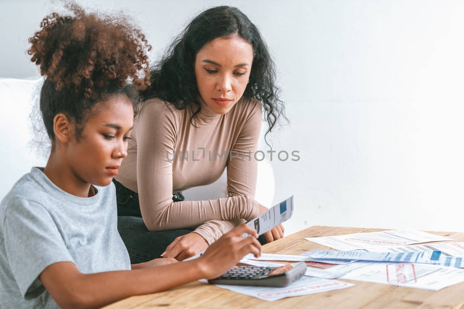Stressed African women has financial problems credit card debt to pay crucial by biancoblue