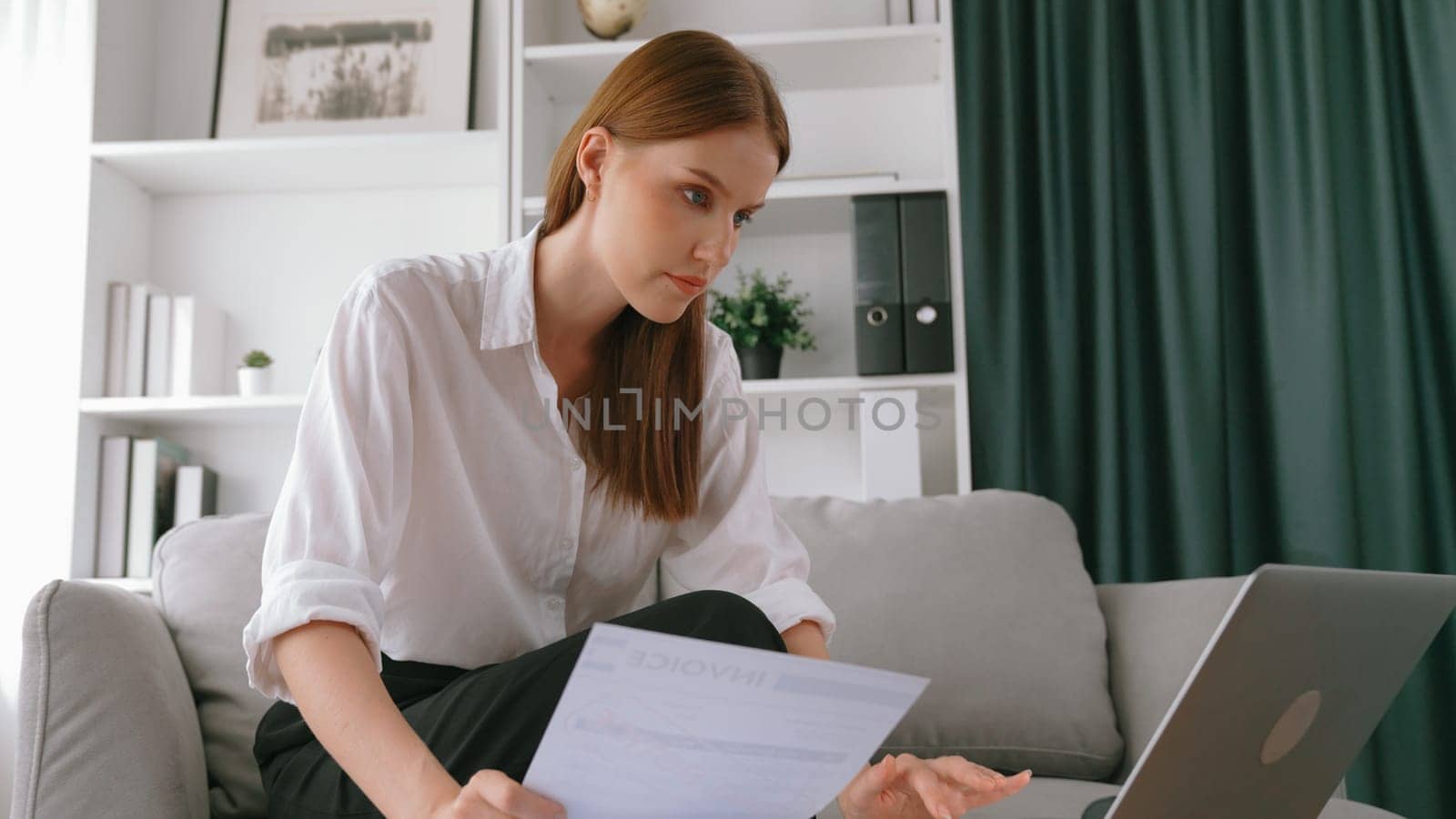 Stressed young woman has financial problems with credit card debt to pay prim from bad personal money and mortgage pay management crisis. Woman worry about financial bankruptcy risk from over spending