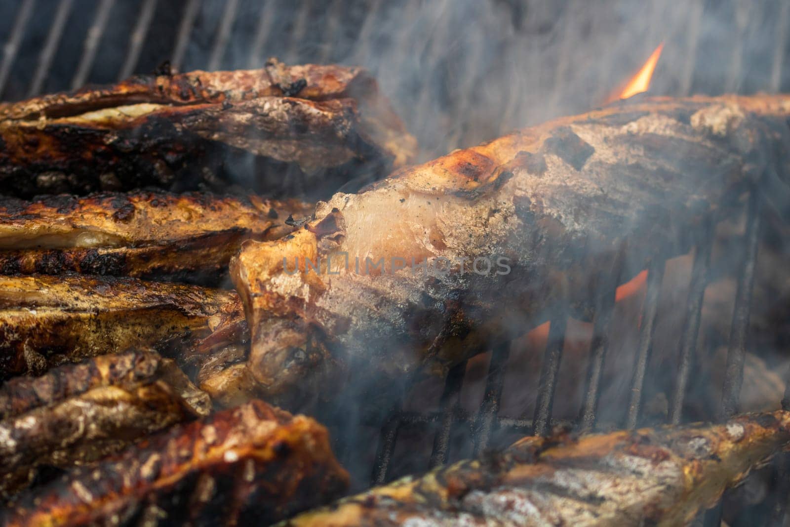 Grilled fish on charcoal grill. Fresh fish barbecue