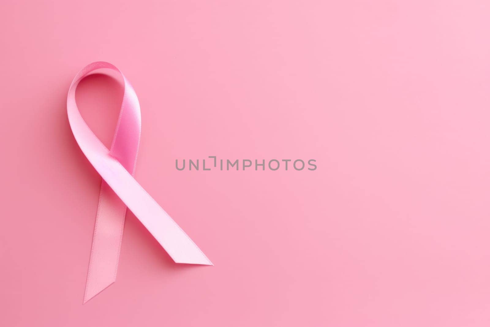 Pink cancer awareness ribbon, pink background. Generative AI.