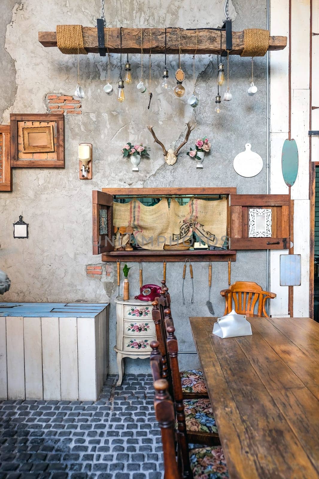 interior of a Vintage Dining Room with decorative objects and furniture by ponsulak