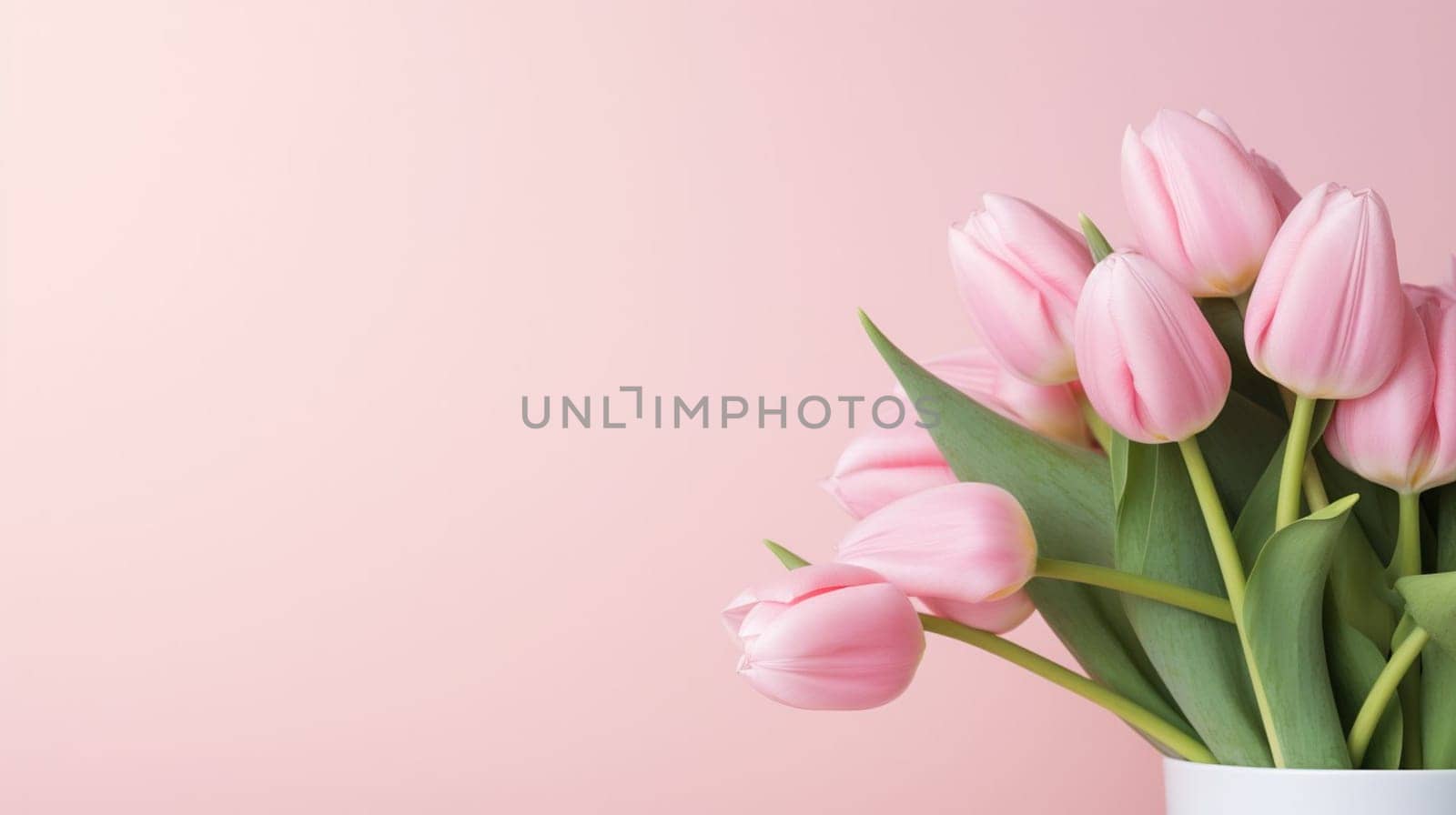 Pink tulips flowers on pastel pink background. Spring and easter greeting card design layout. Flat lay, top view, copy space. High quality photo