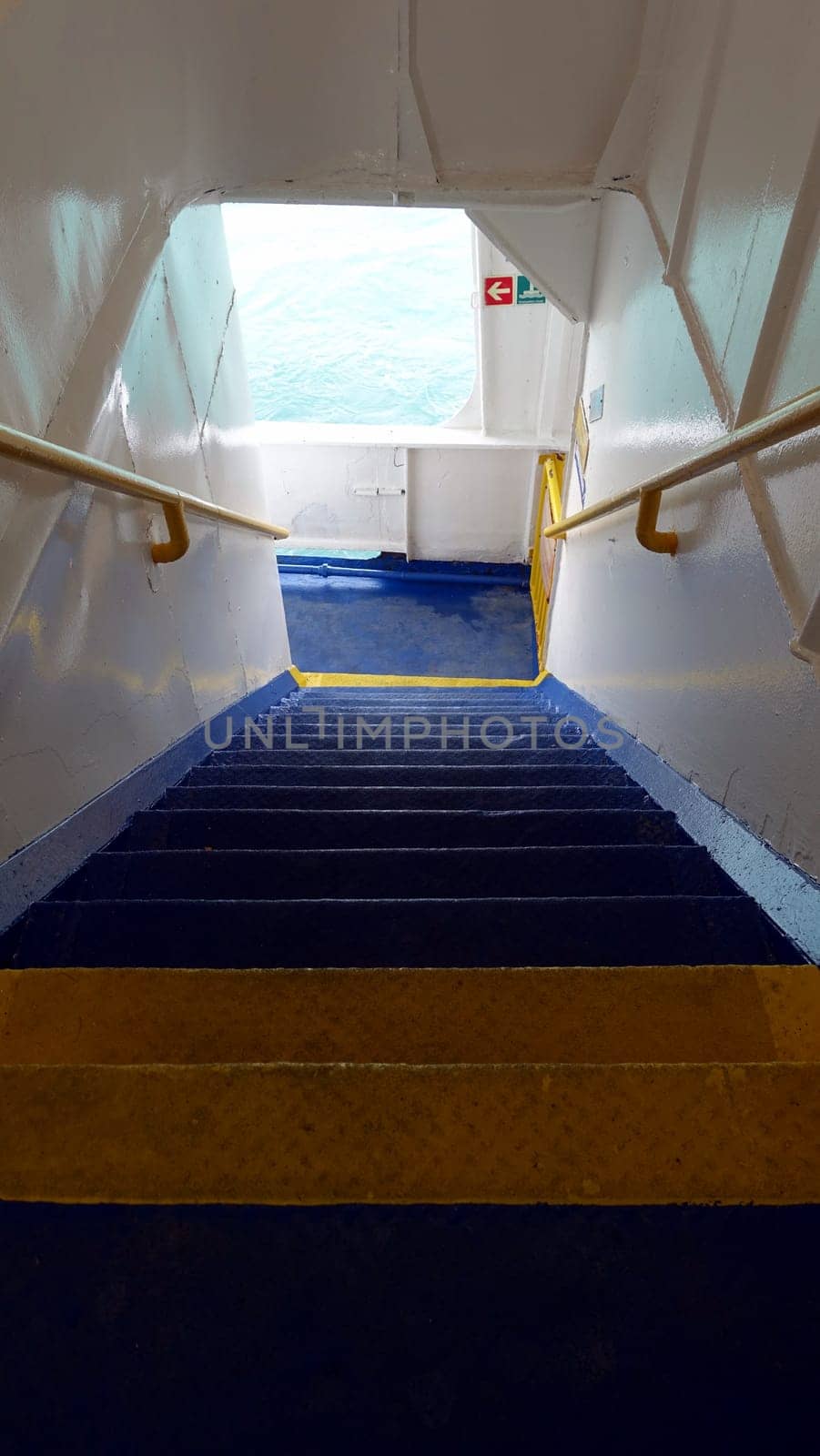 The stairs of a ferry towards the Mediterranean islands. by Jamaladeen