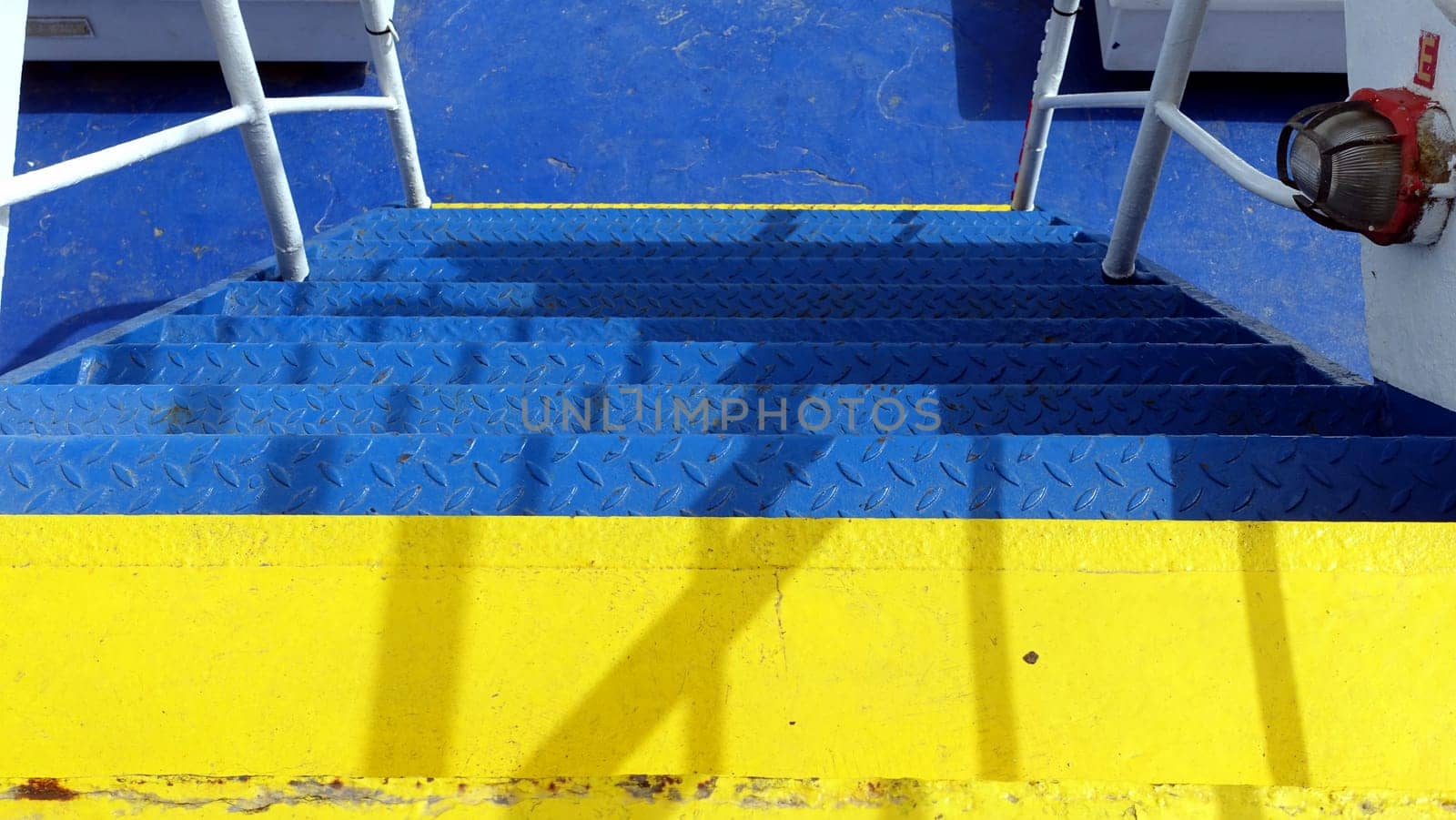 The stairs of a ferry towards the Mediterranean islands. by Jamaladeen