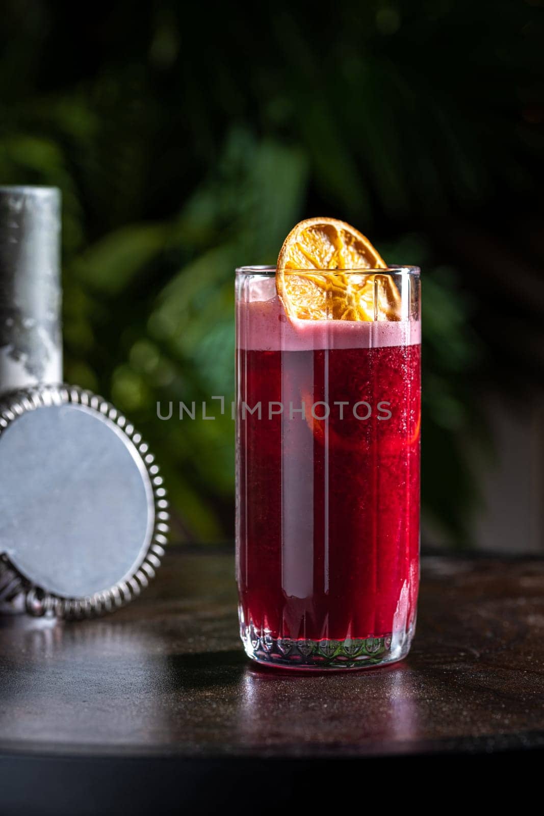 Luxury cocktail on the wooden table on a dark background