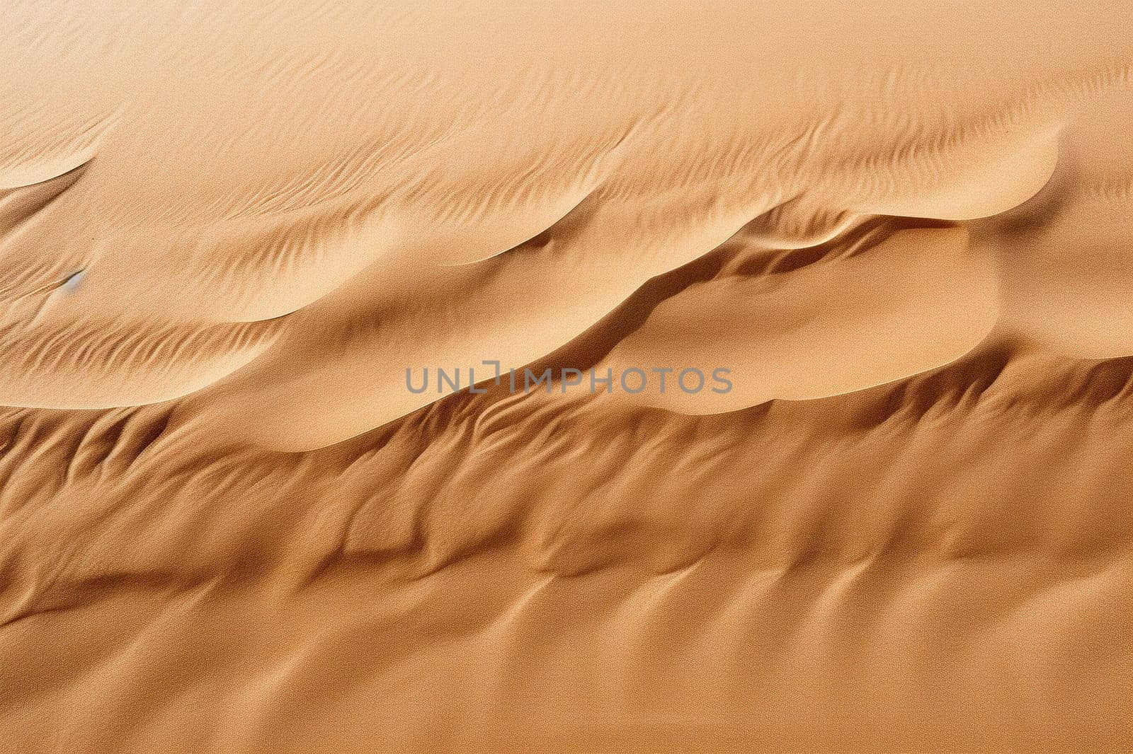 Wavy sand background. Sand texture in the desert or on the beach.