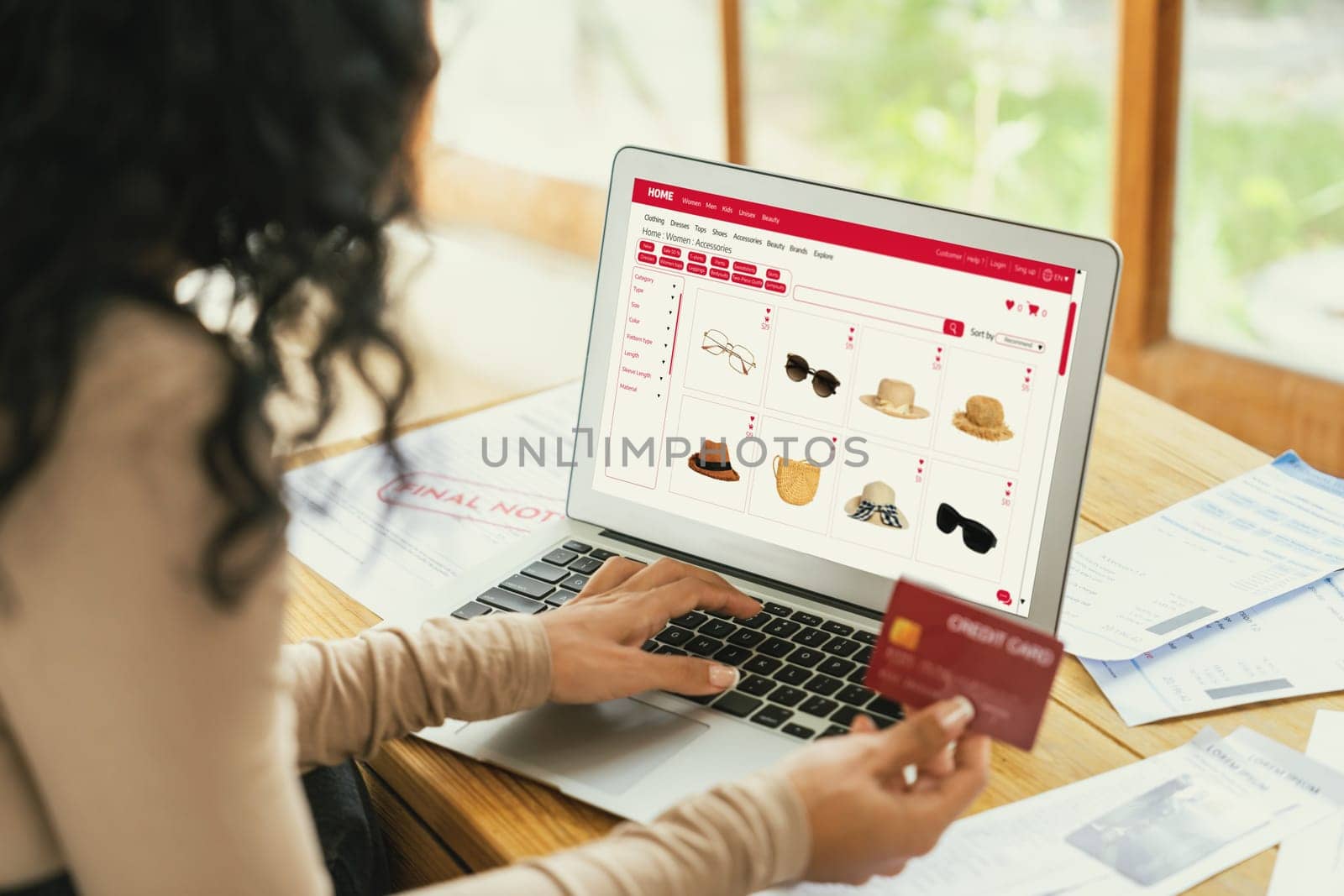 Woman shopping online on internet marketplace browsing for sale items for modern lifestyle and use credit card for online payment from wallet protected by crucial cyber security software