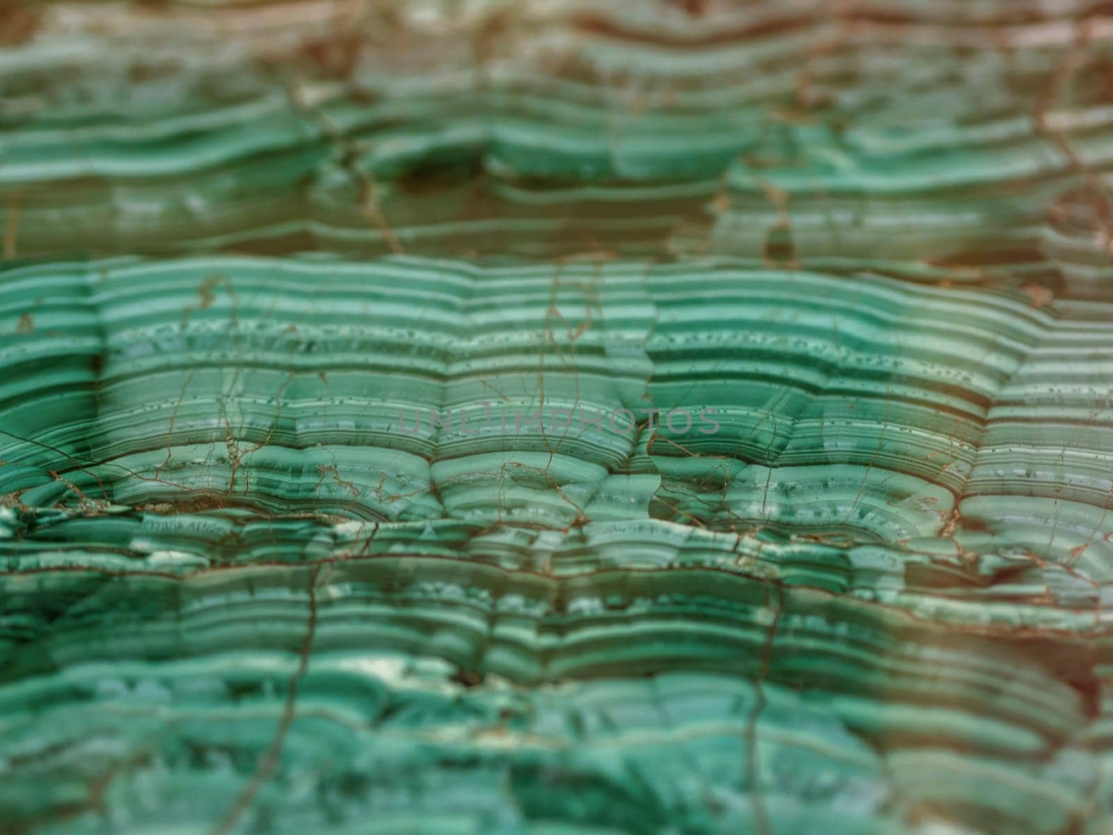natural texture background - malachite mineral gemstone close up.
