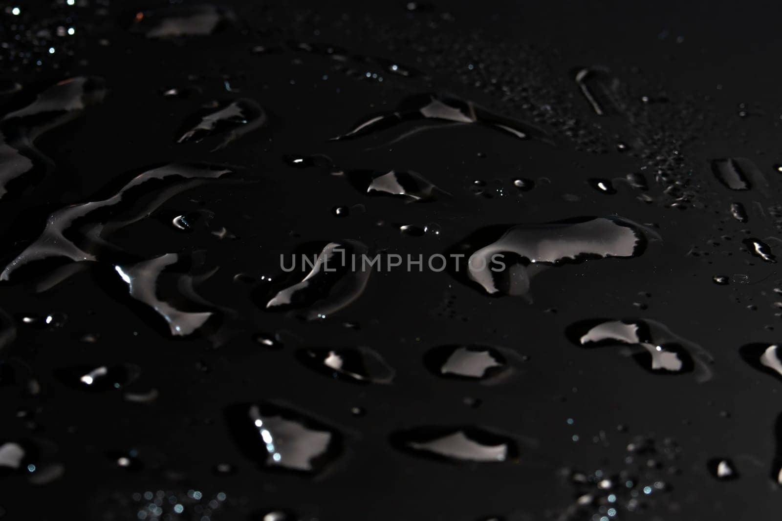 Water drops on black background