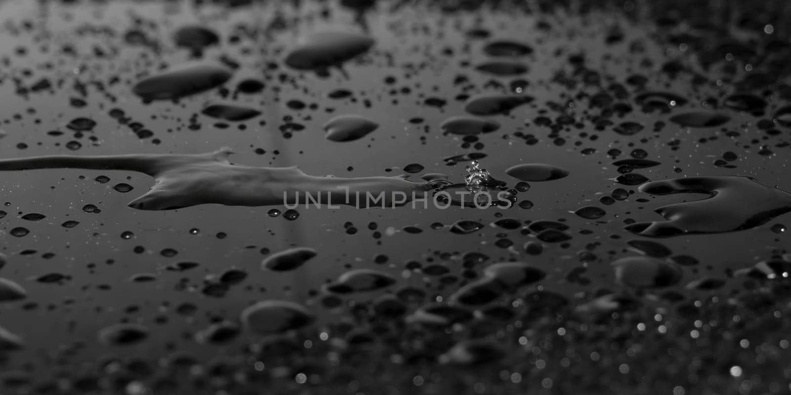 Water drops on black background