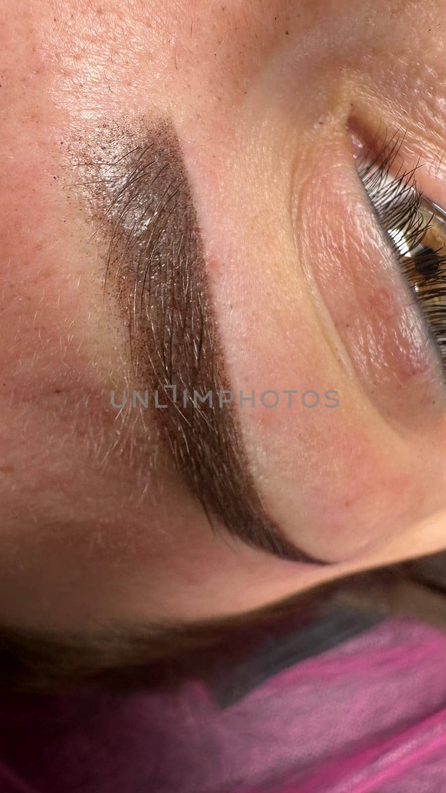 Eyebrows tattoo or Permanent Makeup. Detail of beautiful woman