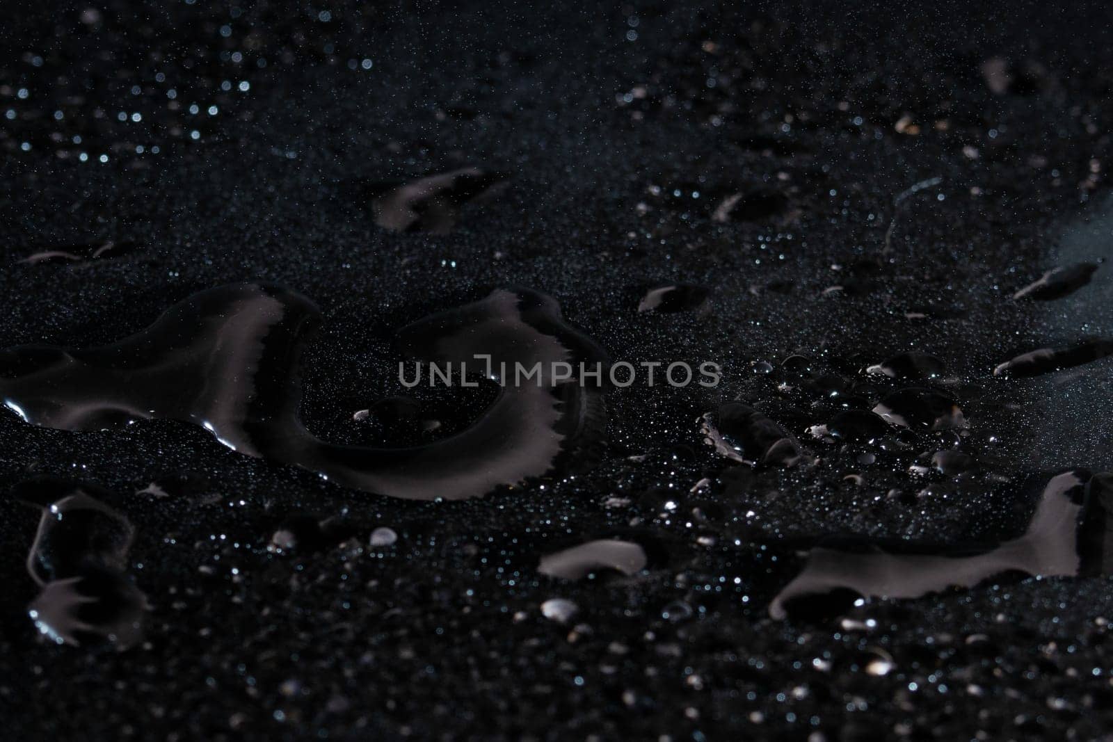Water drops on black background
