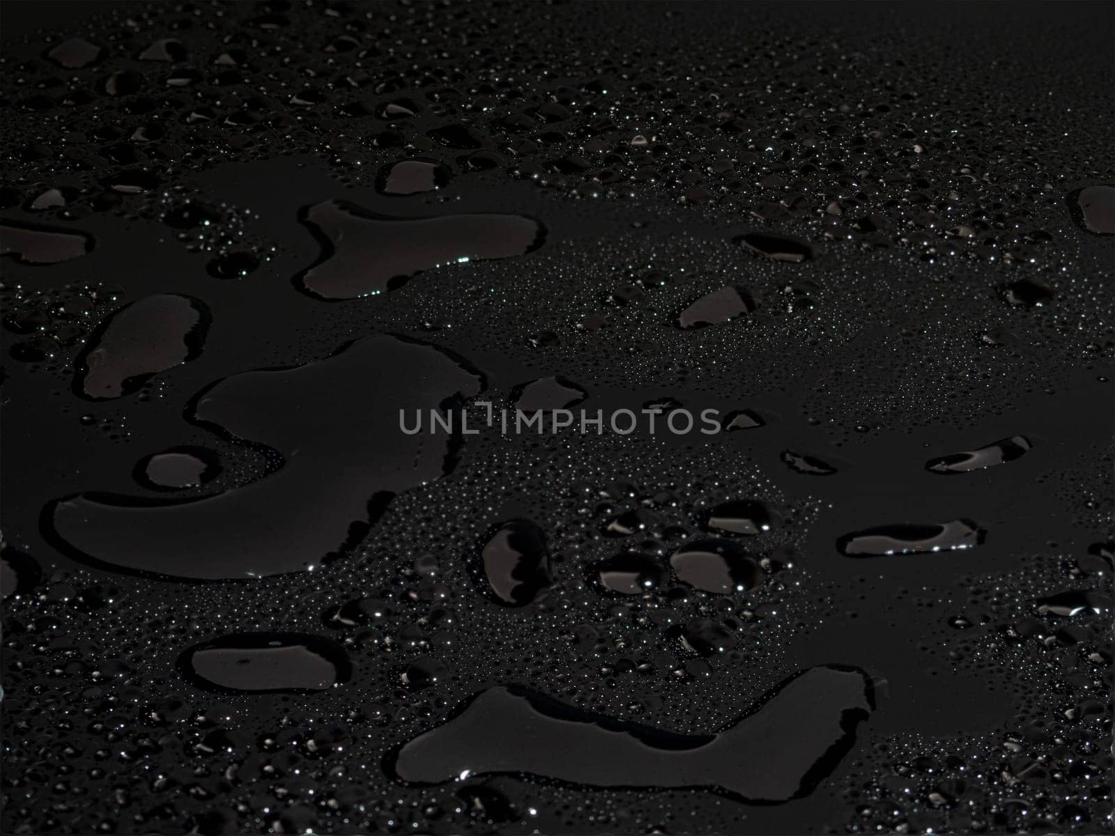 Water drops on black background