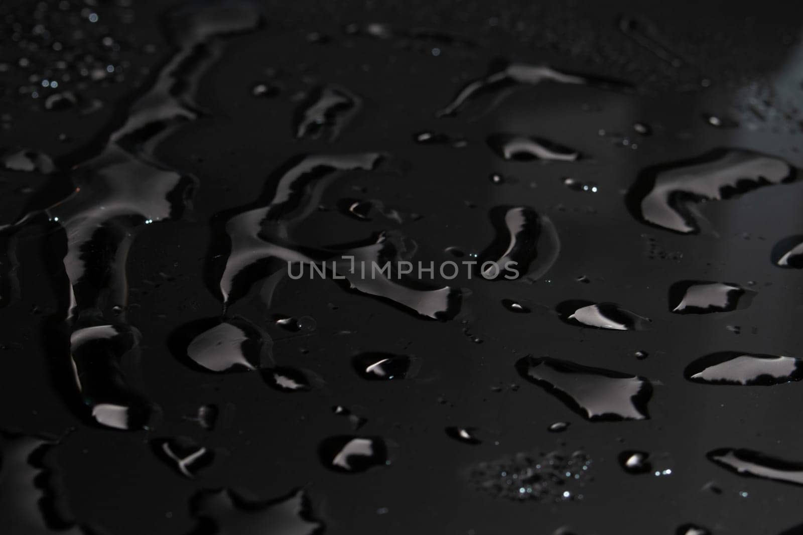 Water drops on black background