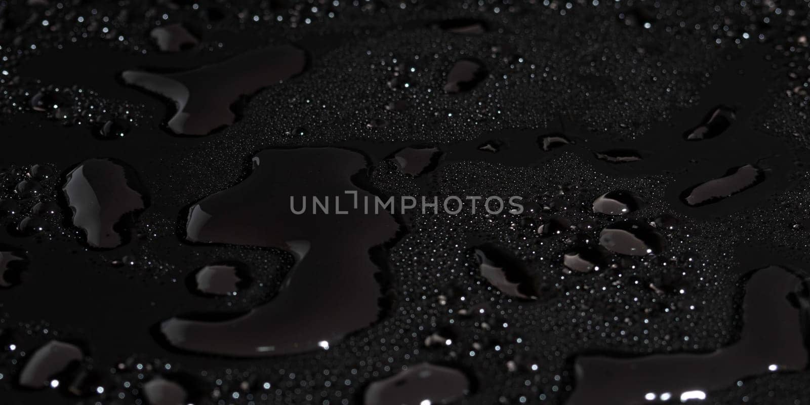 Water drops on black background