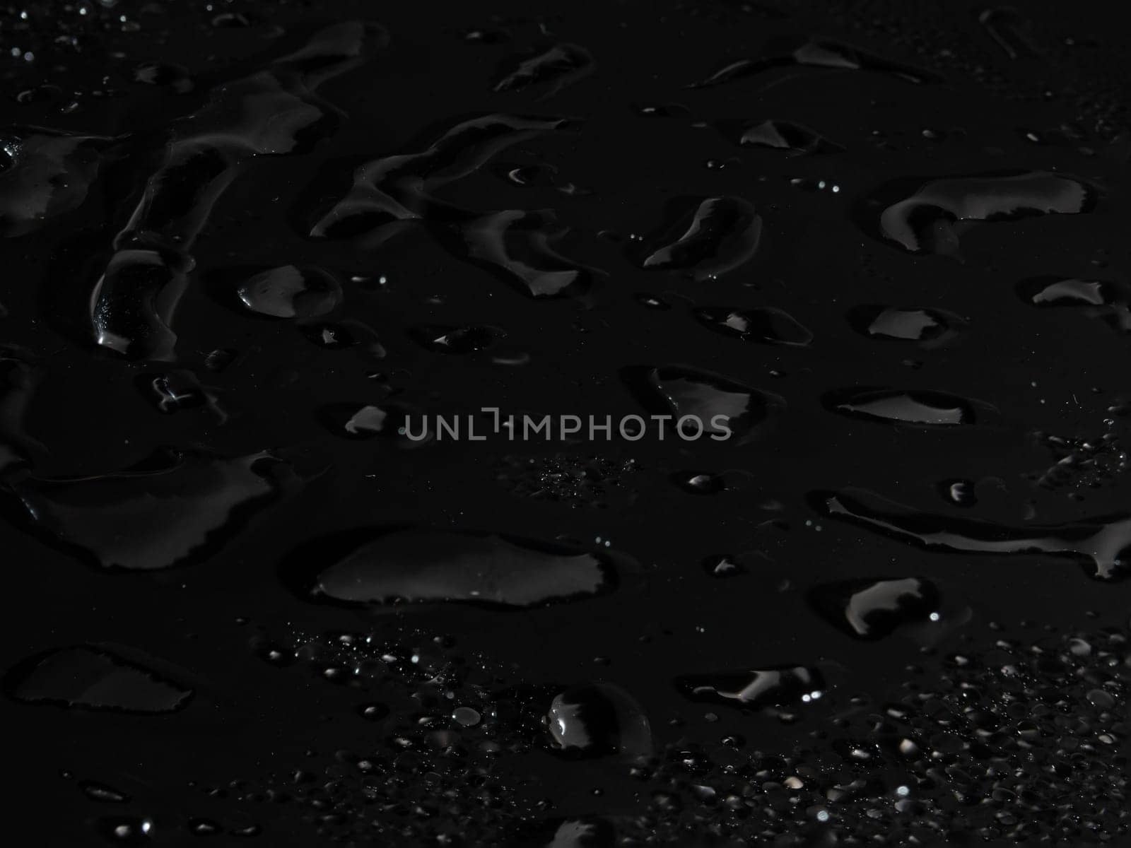 Water drops on black background