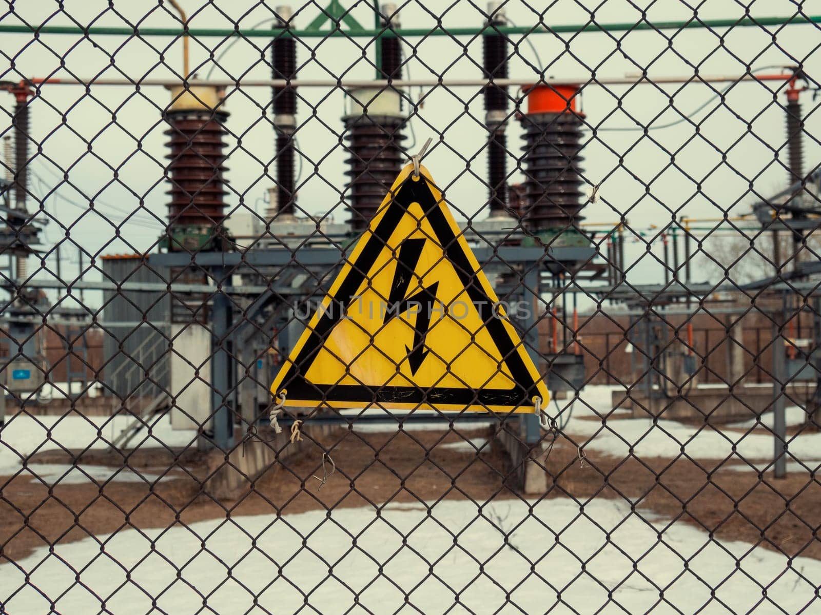 high voltage warning sign on high-voltage substation
