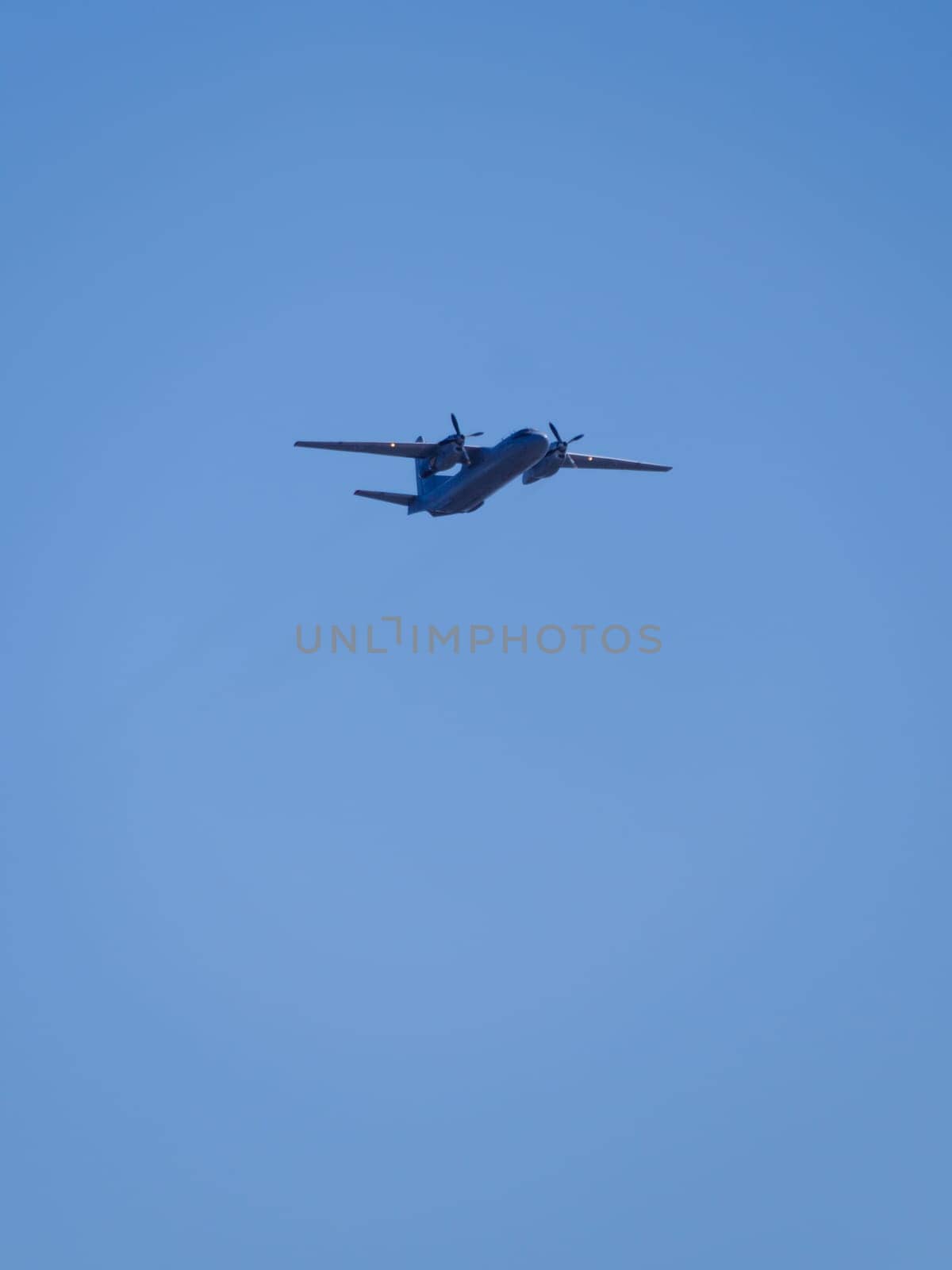 Russia, St. Petersburg - June 24, 2020: Russian military an-26 plane of the Russian Air Force in flight at the Victory Parade in World War II.