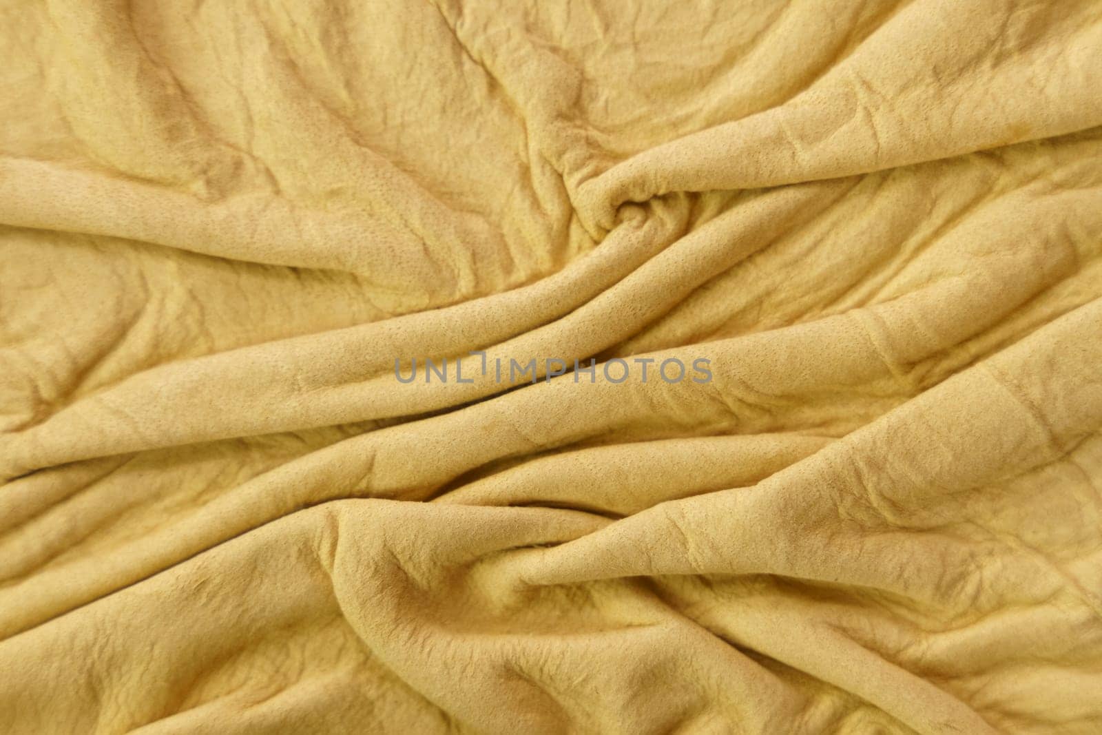 Yellow leather texture with folds used as a classic background. by Sd28DimoN_1976